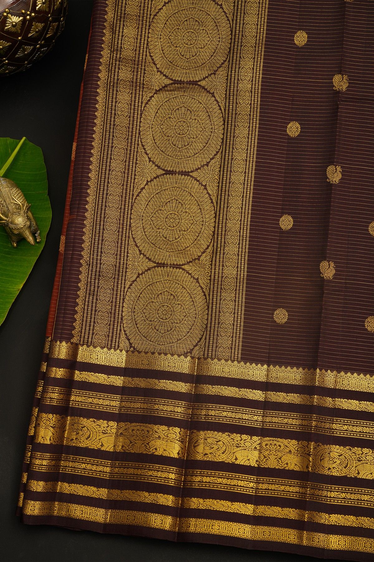 Kancheepuram Silk Rust Saree With Florals In Zari Lines Body And Contrast Traditional Border