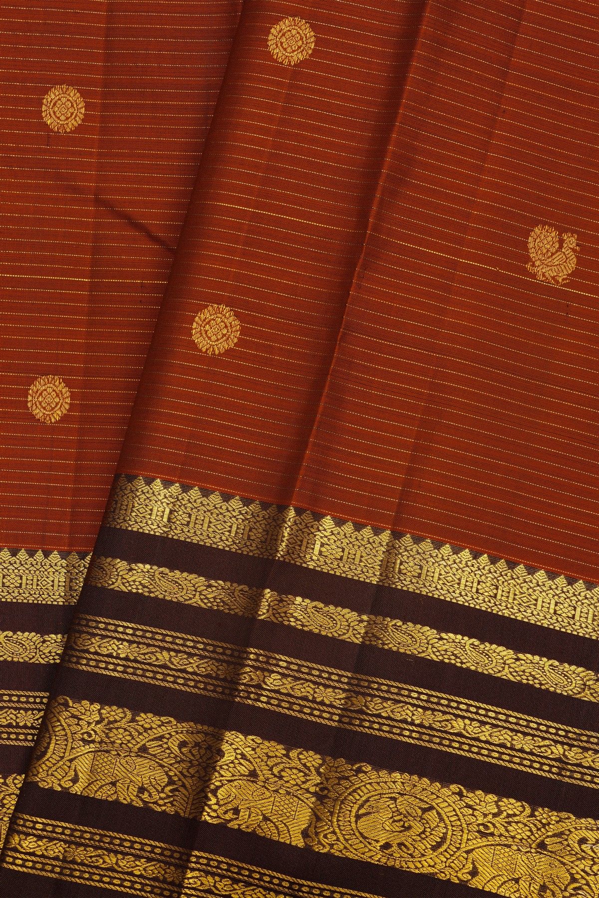 Kancheepuram Silk Rust Saree With Florals In Zari Lines Body And Contrast Traditional Border