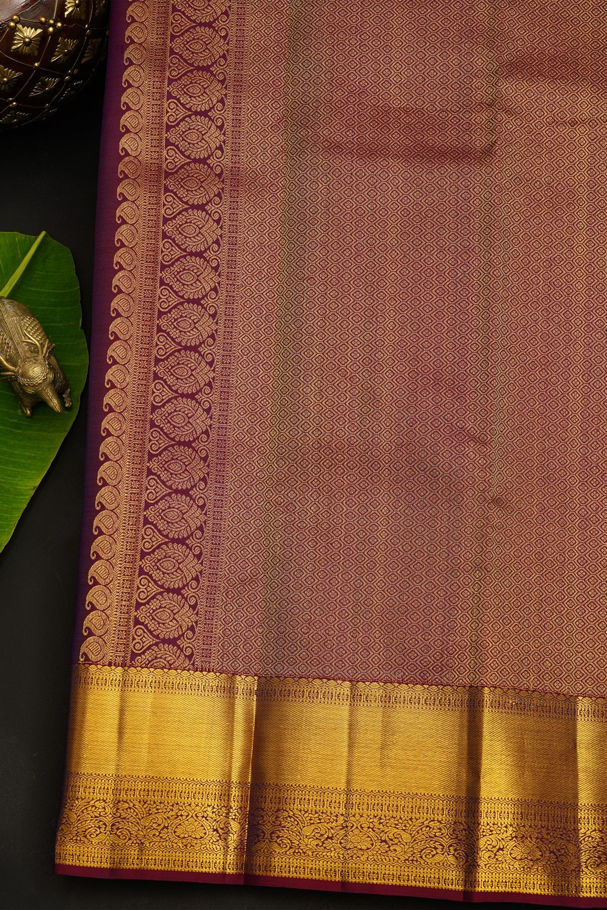 Kancheepuram Silk Blue Saree With Florals And Leaves In Zari Body And Contrast Florals And Leaves With Cross Lines Border