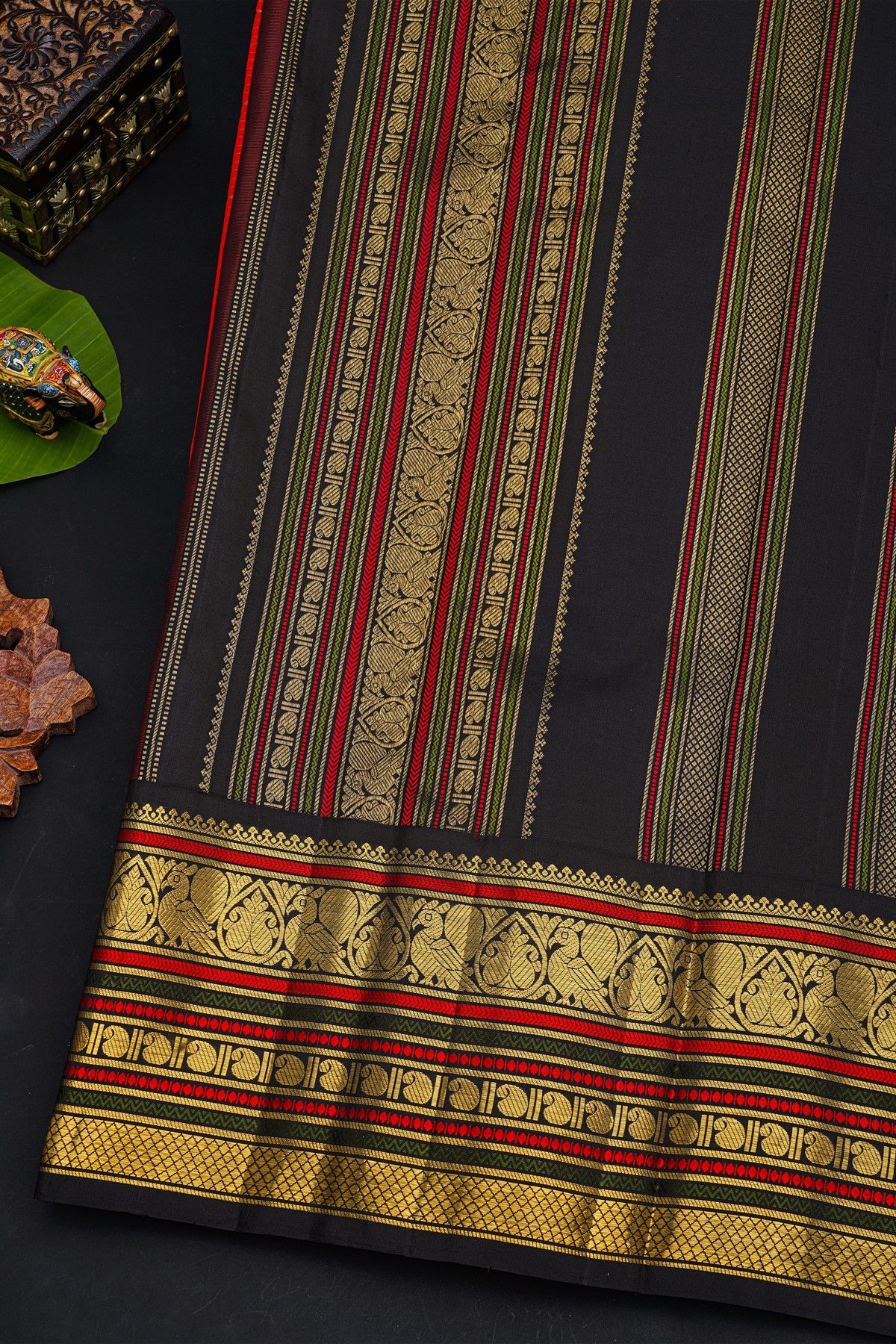 Kancheepuram Silk Orange Saree With Contrast Florals And Peacocks Border