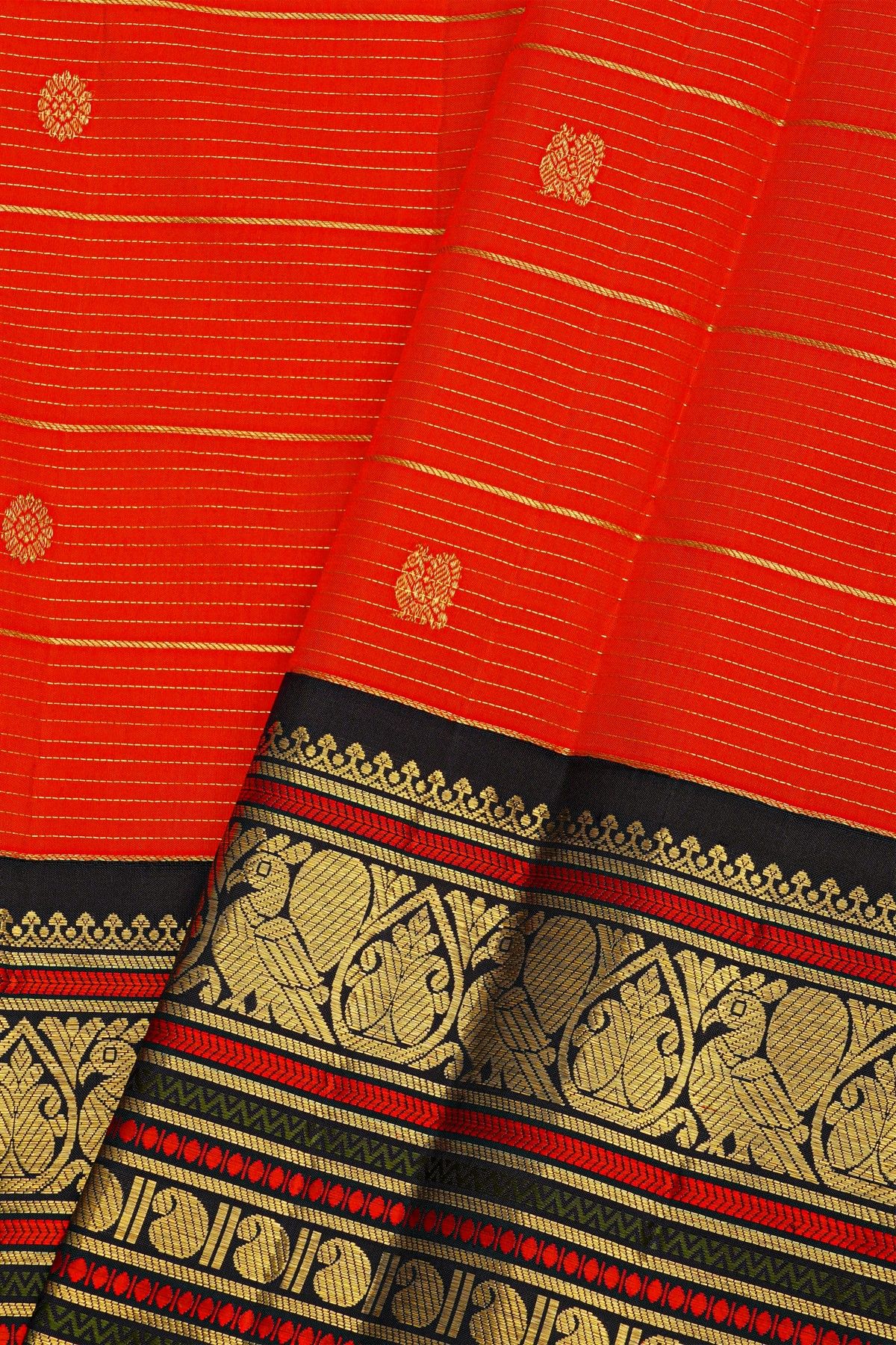 Kancheepuram Silk Orange Saree With Contrast Florals And Peacocks Border