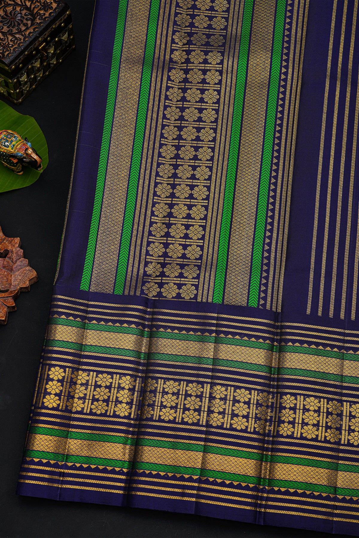 Kancheepuram Silk Parrot Green Saree With Buttis And Zari Lines Body