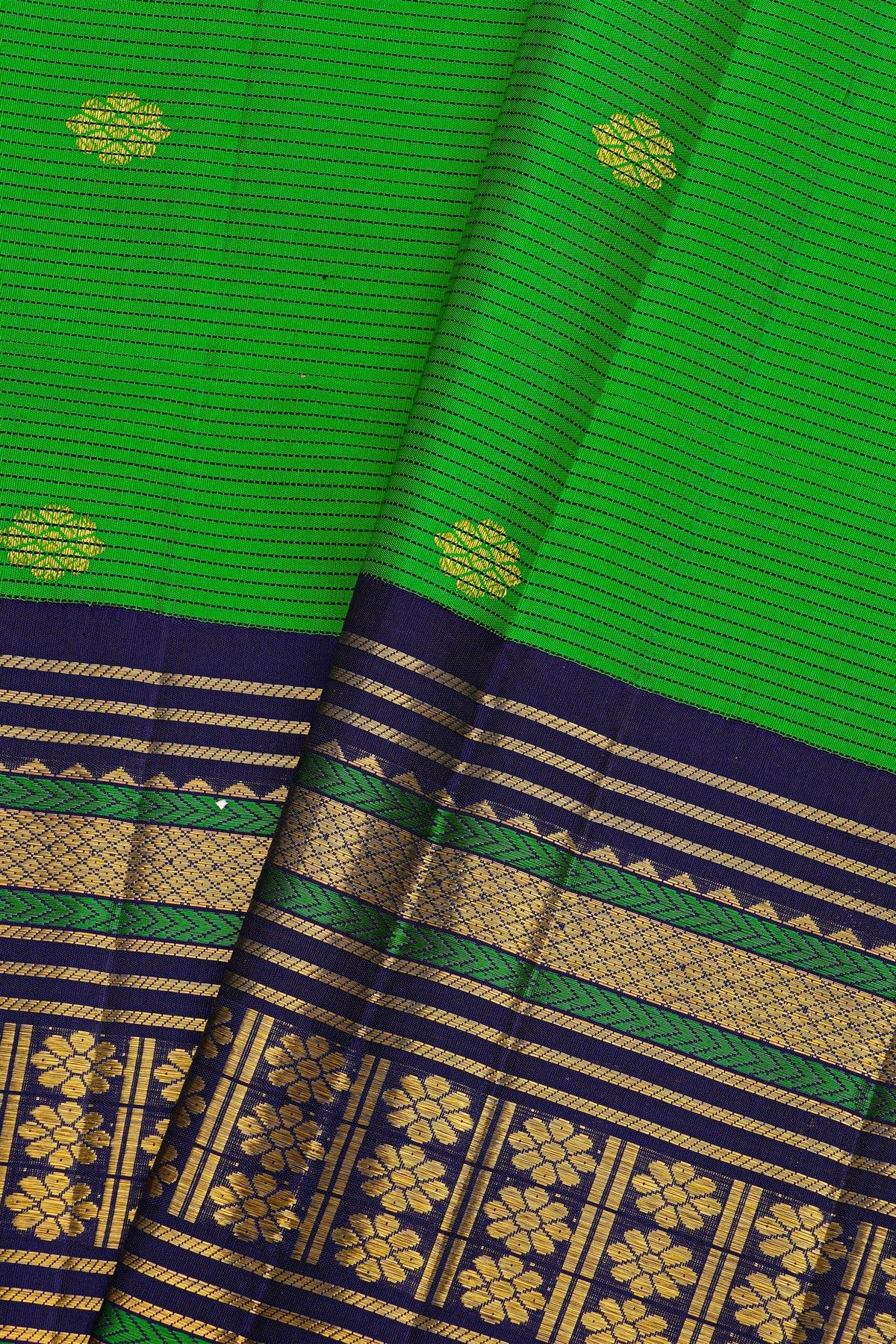 Kancheepuram Silk Parrot Green Saree With Buttis And Zari Lines Body