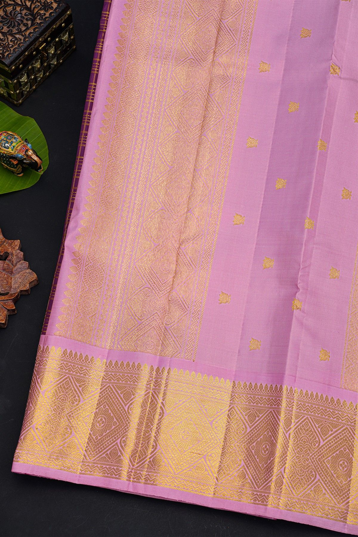 Kancheepuram Silk Purple Saree With Contrast Florals And Leaves Border