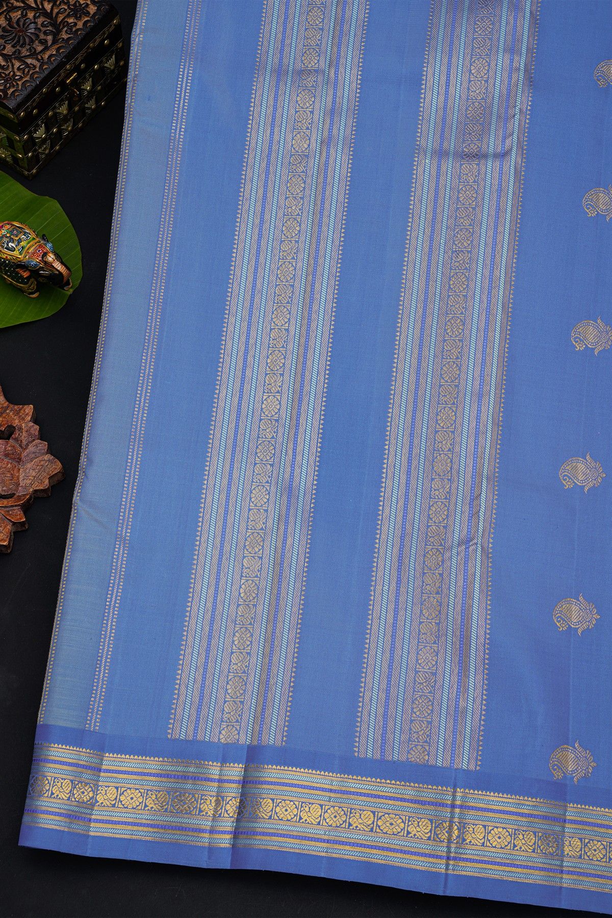 Kancheepuram Silk Pastel Green Saree With Contrast Florals And Peacocks Border