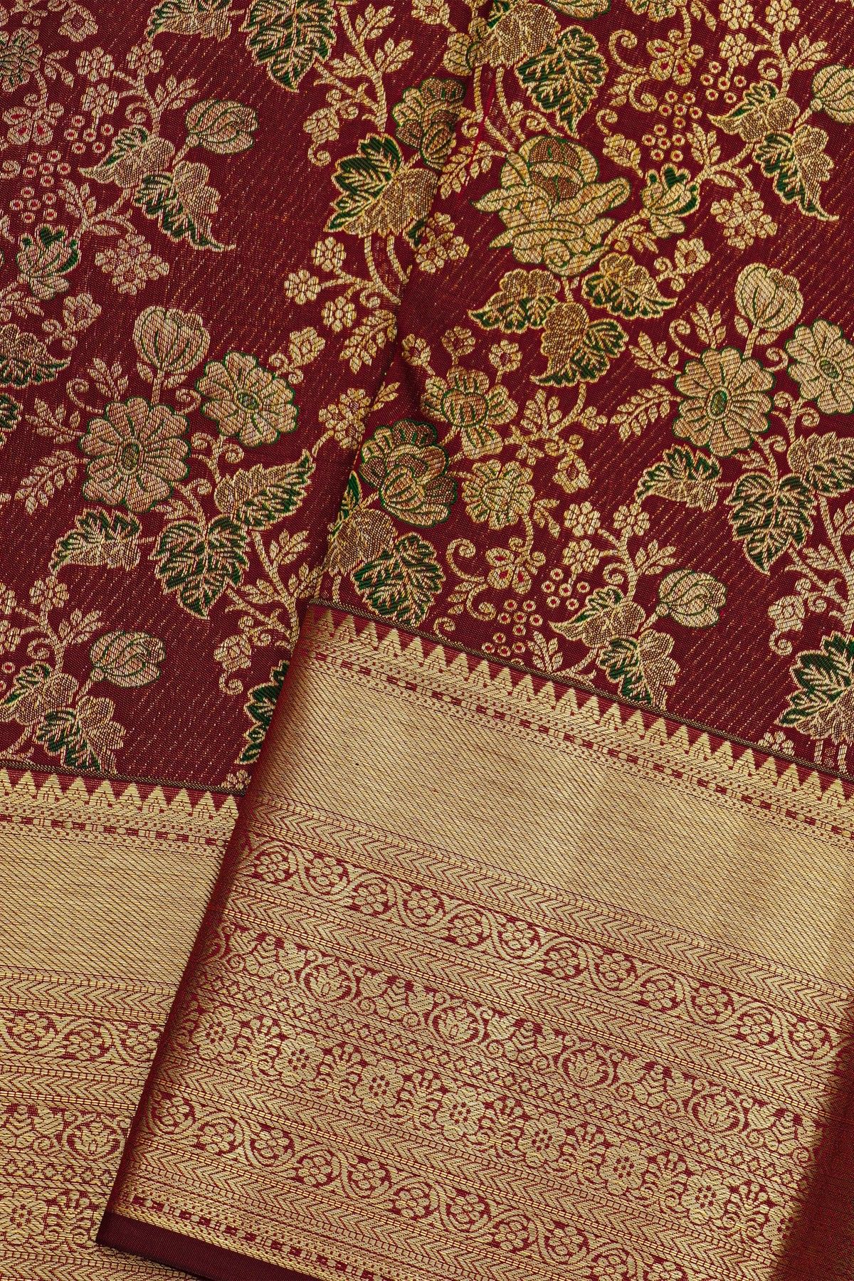 Kancheepuram Silk Maroon Saree With Florals And Leaves Jaal In Silver Zari Body Self Border
