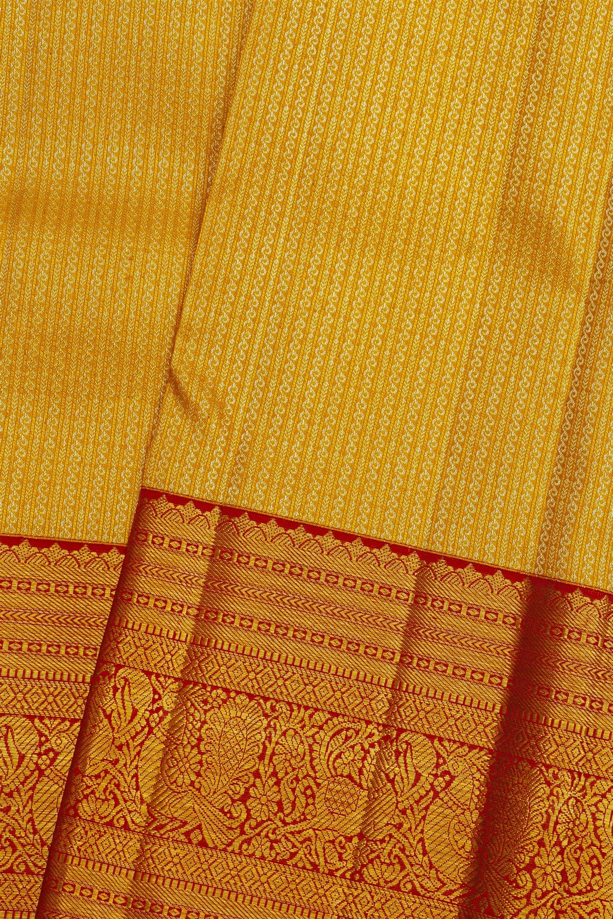 Kancheepuram Silk Yellow Saree With Florals And Leaves Border