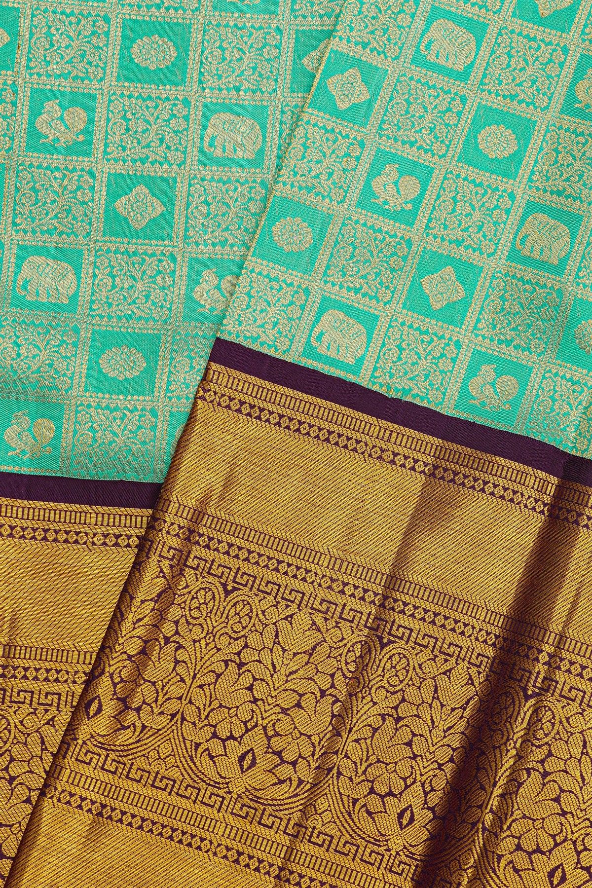 Kancheepuram Silk Sea Green Saree With Florals And Leaves Jaal Border
