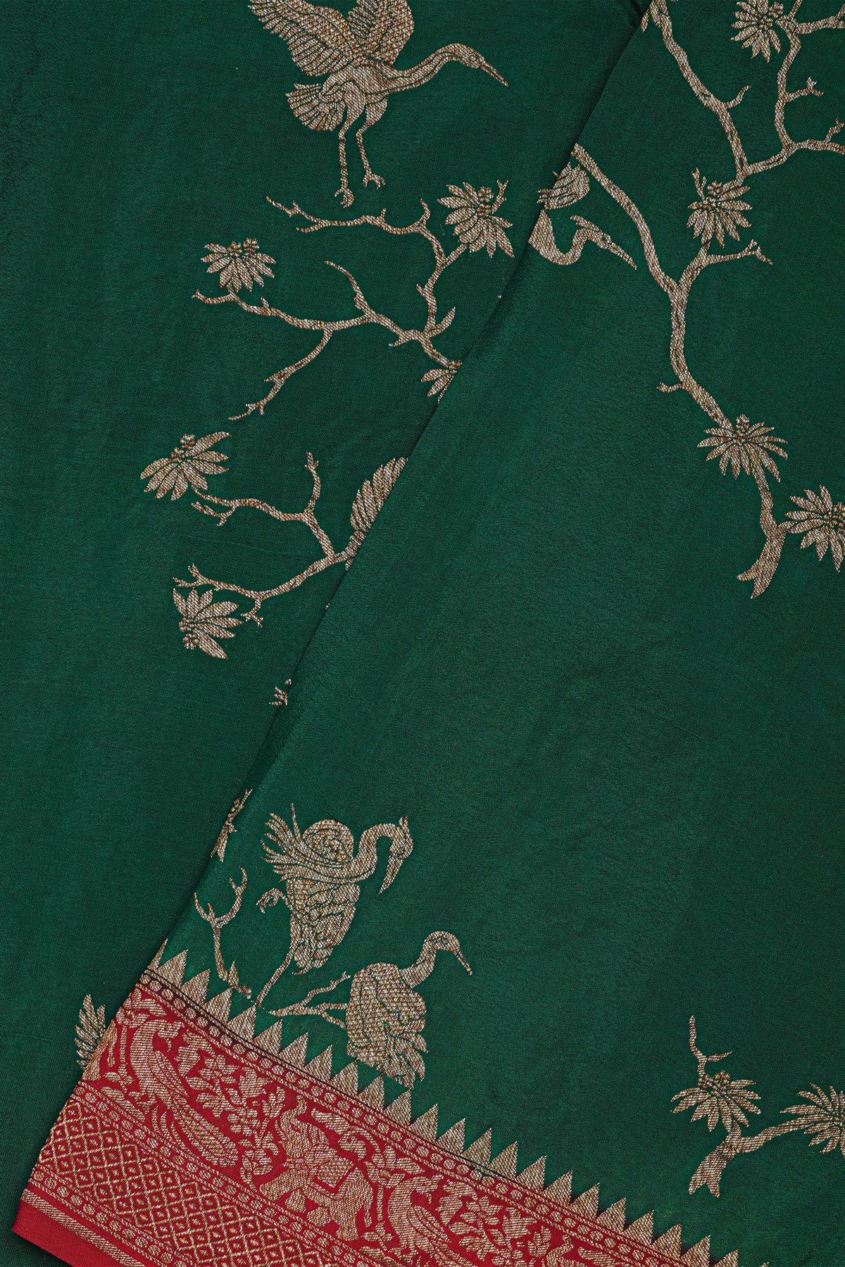Banarasi Kaddi Georgette Bottle Green Saree With Florals And Cranes Body
