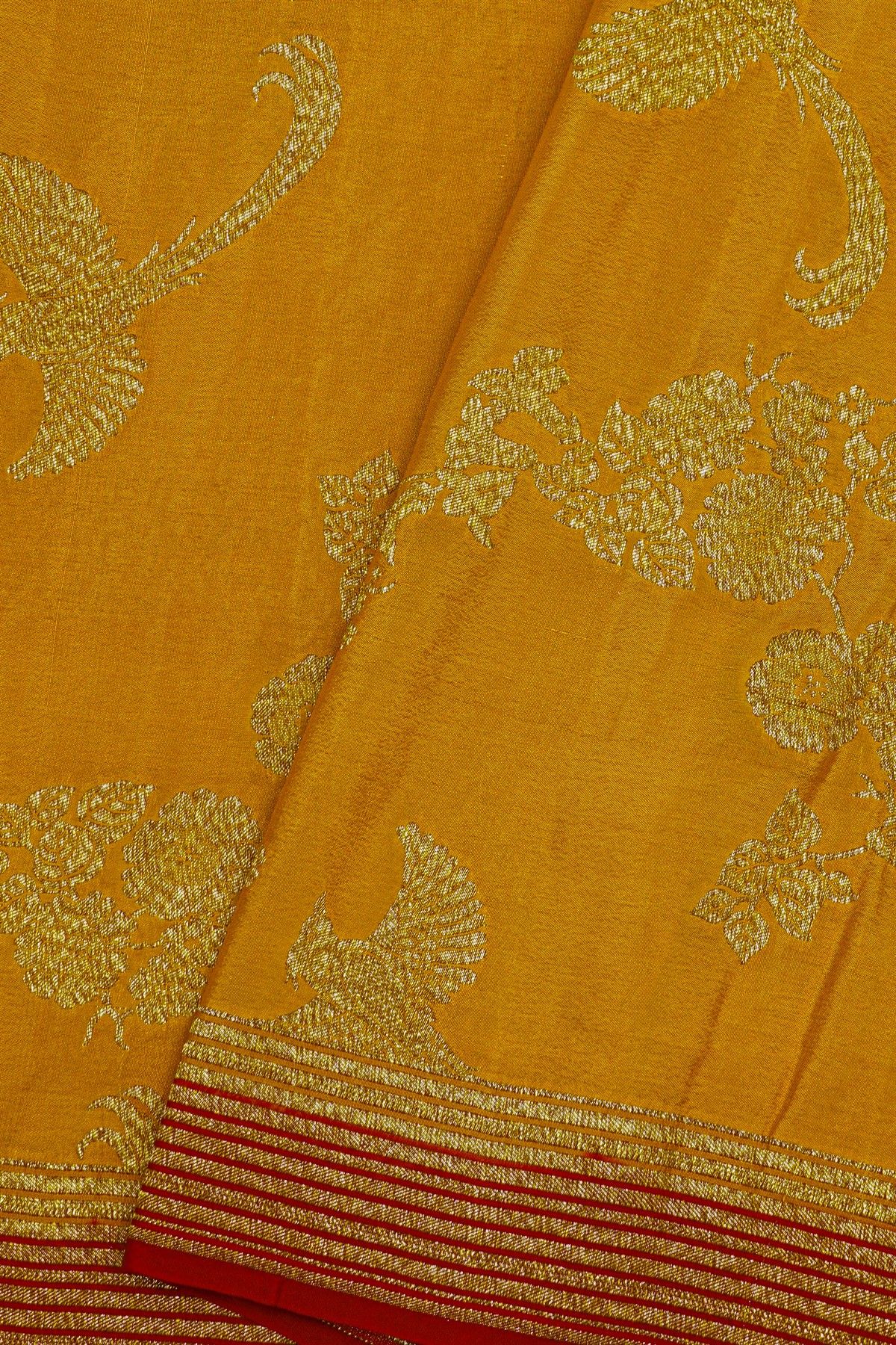 Fancy Georgette Yellow Saree With Florals And Leaves With Birds Body And Contrast Kaddi Border