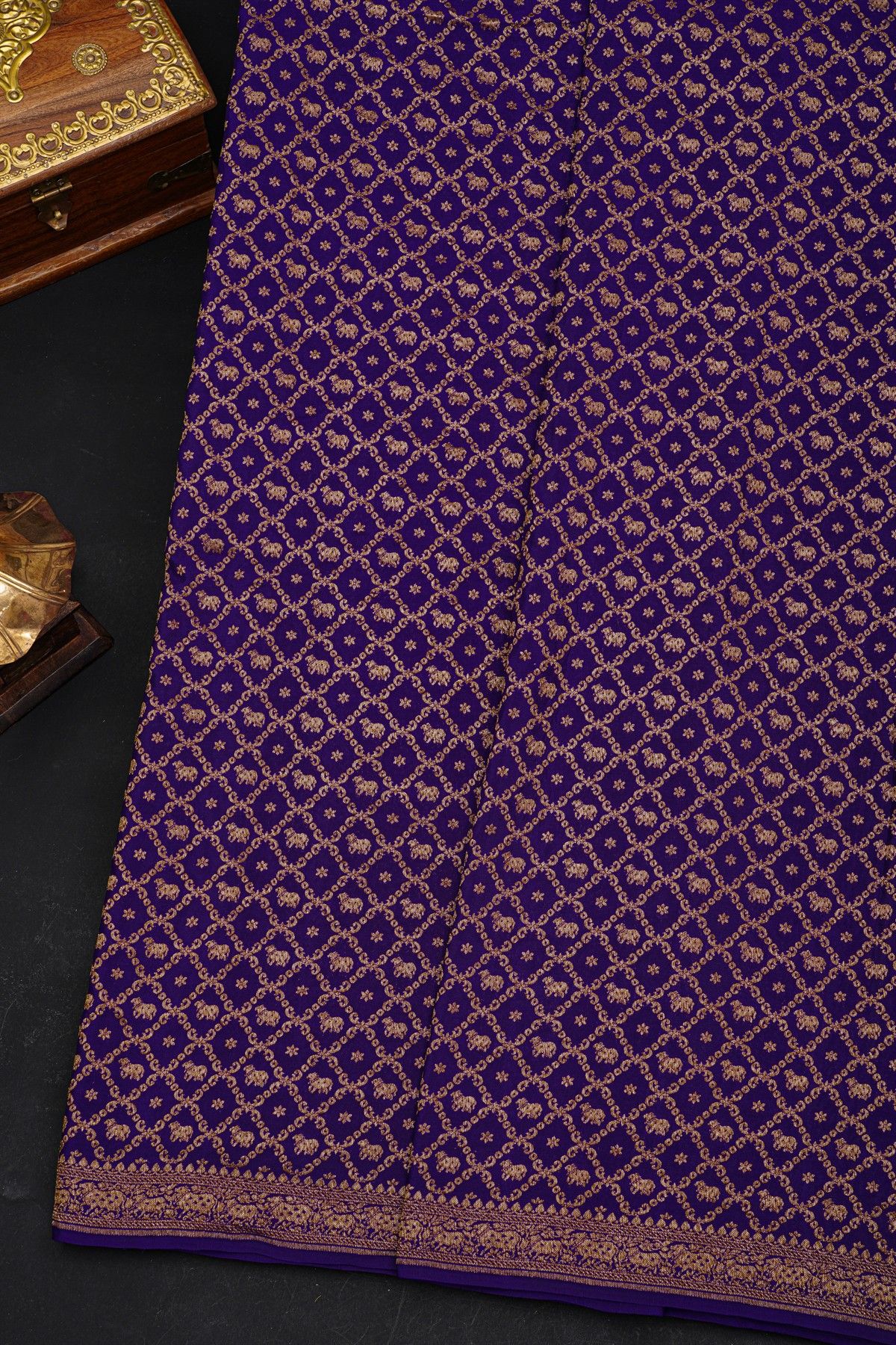 Fancy Georgette Royal Blue Saree With Diamond Grid Zari Jaal And Elephant Buttis Body And Self Florals And Animals Border