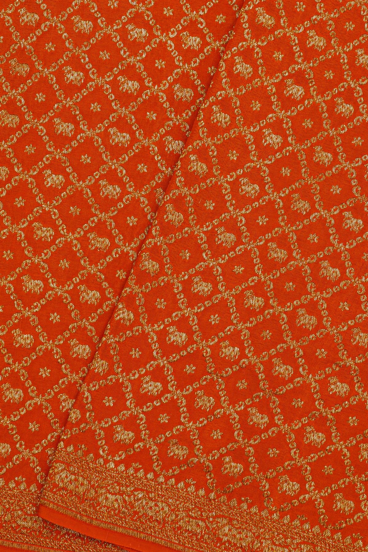 Fancy Georgette Orange Saree With Diamond Grid Zari Jaal And Elephant Buttis Body And Self Florals And Animals Border