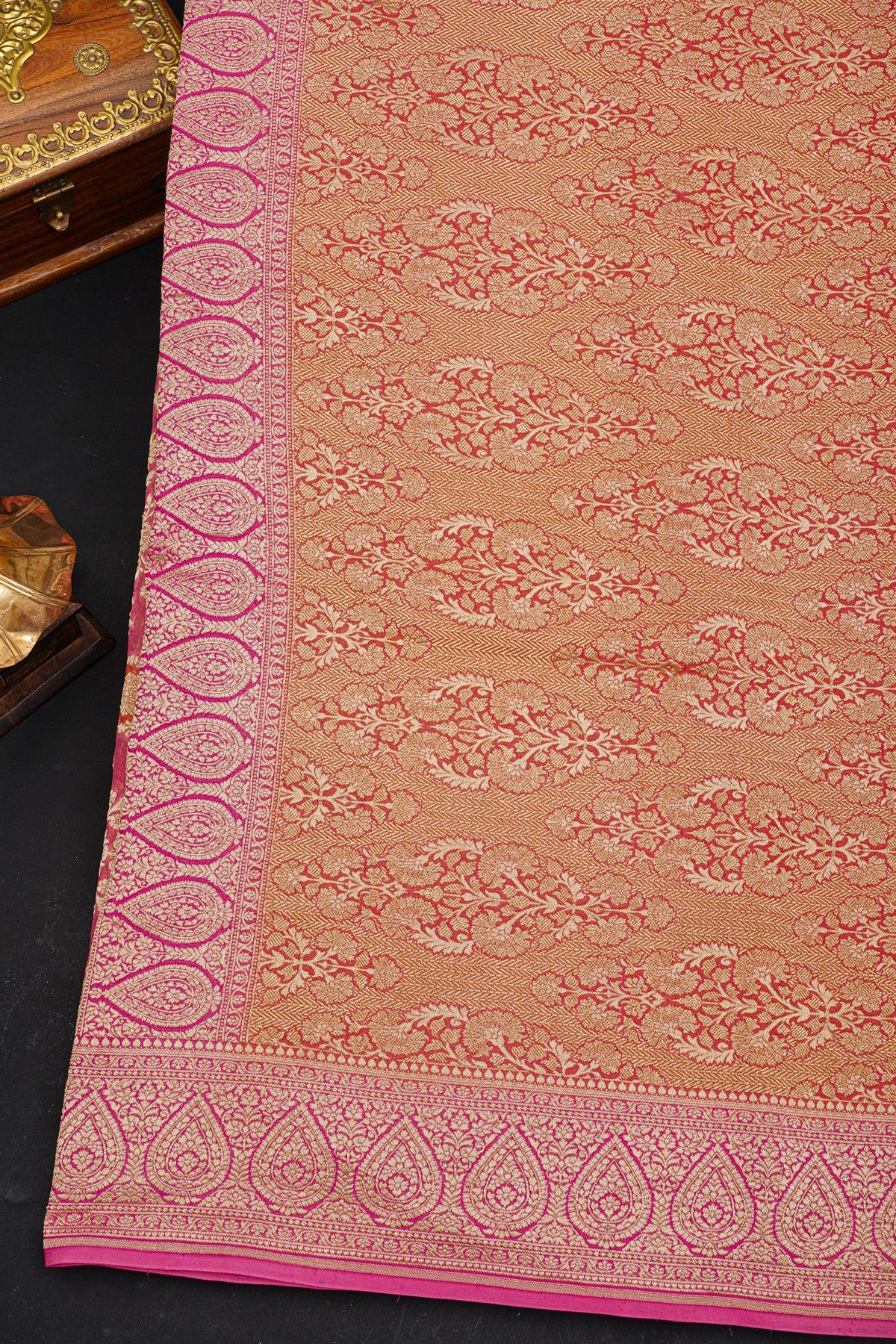 Fancy Georgette Peach Saree With Florals And Leaves Body And Self Florals And Leaves Border