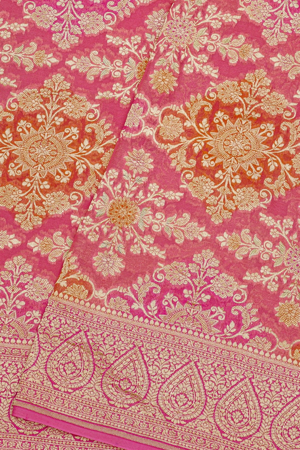 Fancy Georgette Peach Saree With Florals And Leaves Body And Self Florals And Leaves Border