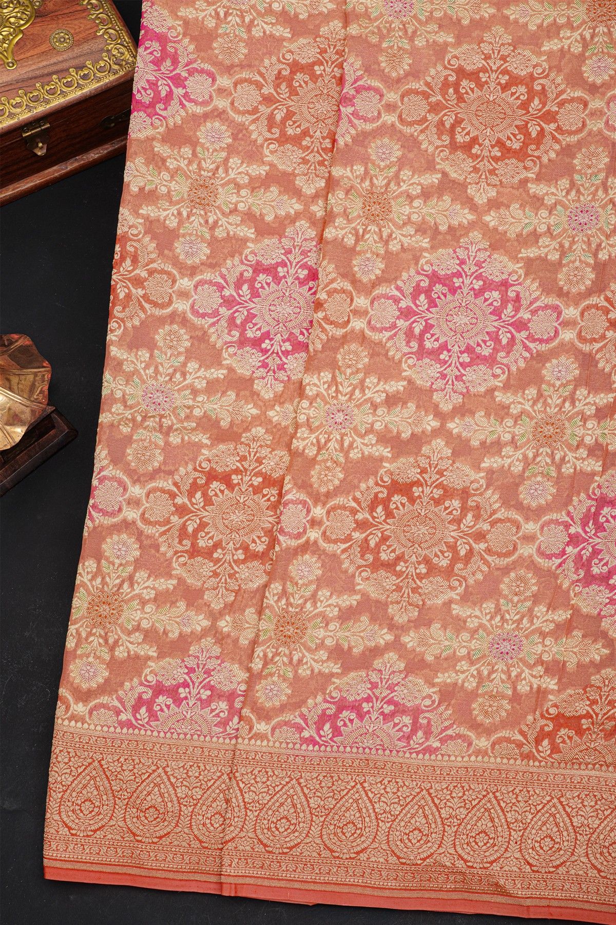 Fancy Georgette Peach Saree With Florals And Leaves Body And Self Florals And Leaves Border