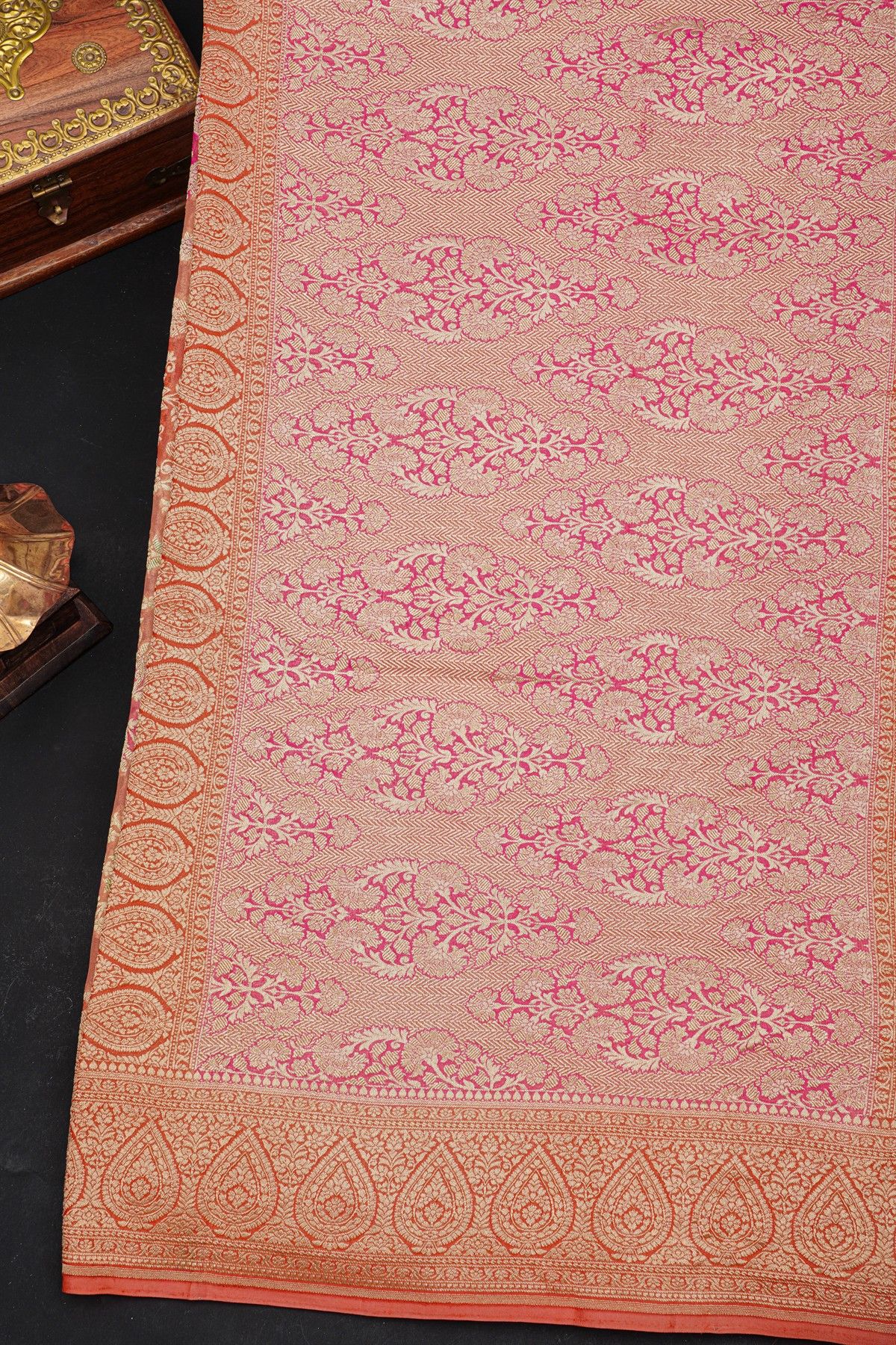 Fancy Georgette Peach Saree With Florals And Leaves Body And Self Florals And Leaves Border