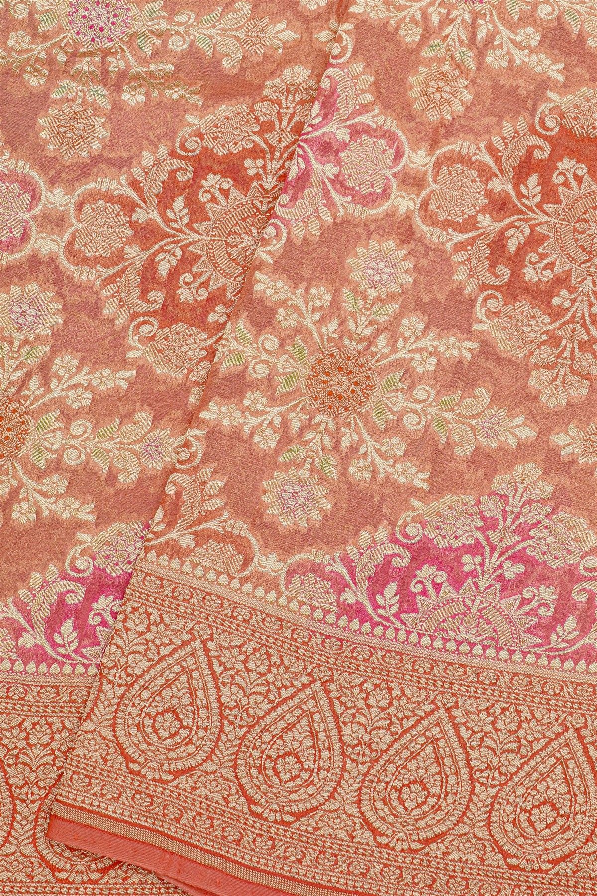 Fancy Georgette Peach Saree With Florals And Leaves Body And Self Florals And Leaves Border