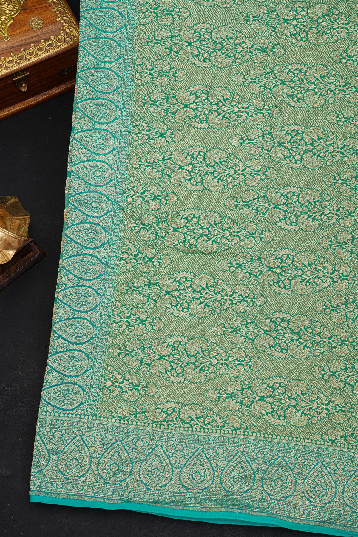Fancy Georgette Sea Green Saree With All Over Florals In Meenakari Design Body