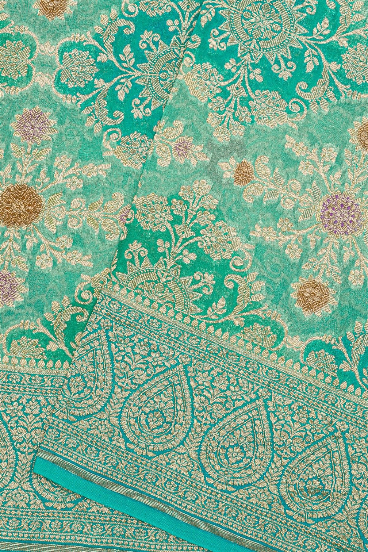 Fancy Georgette Sea Green Saree With All Over Florals In Meenakari Design Body
