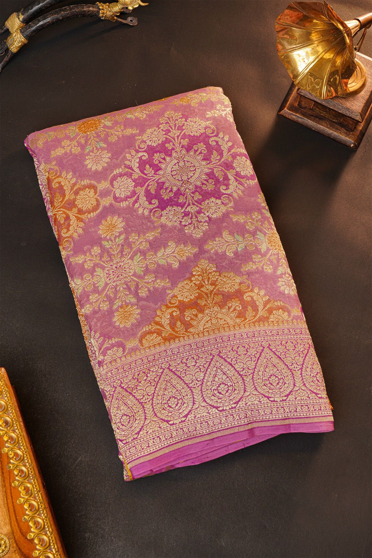 Fancy Georgette Peach Saree With Florals And Leaves Body And Self Florals And Leaves Jaal Border