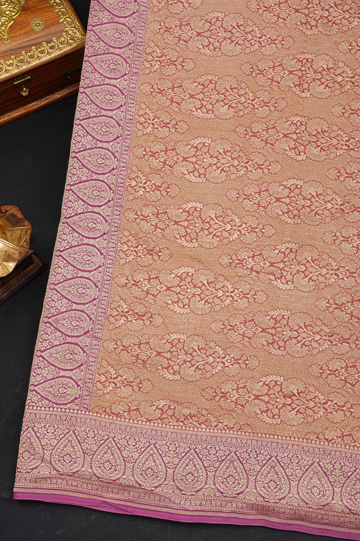 Fancy Georgette Peach Saree With Florals And Leaves Body And Self Florals And Leaves Jaal Border