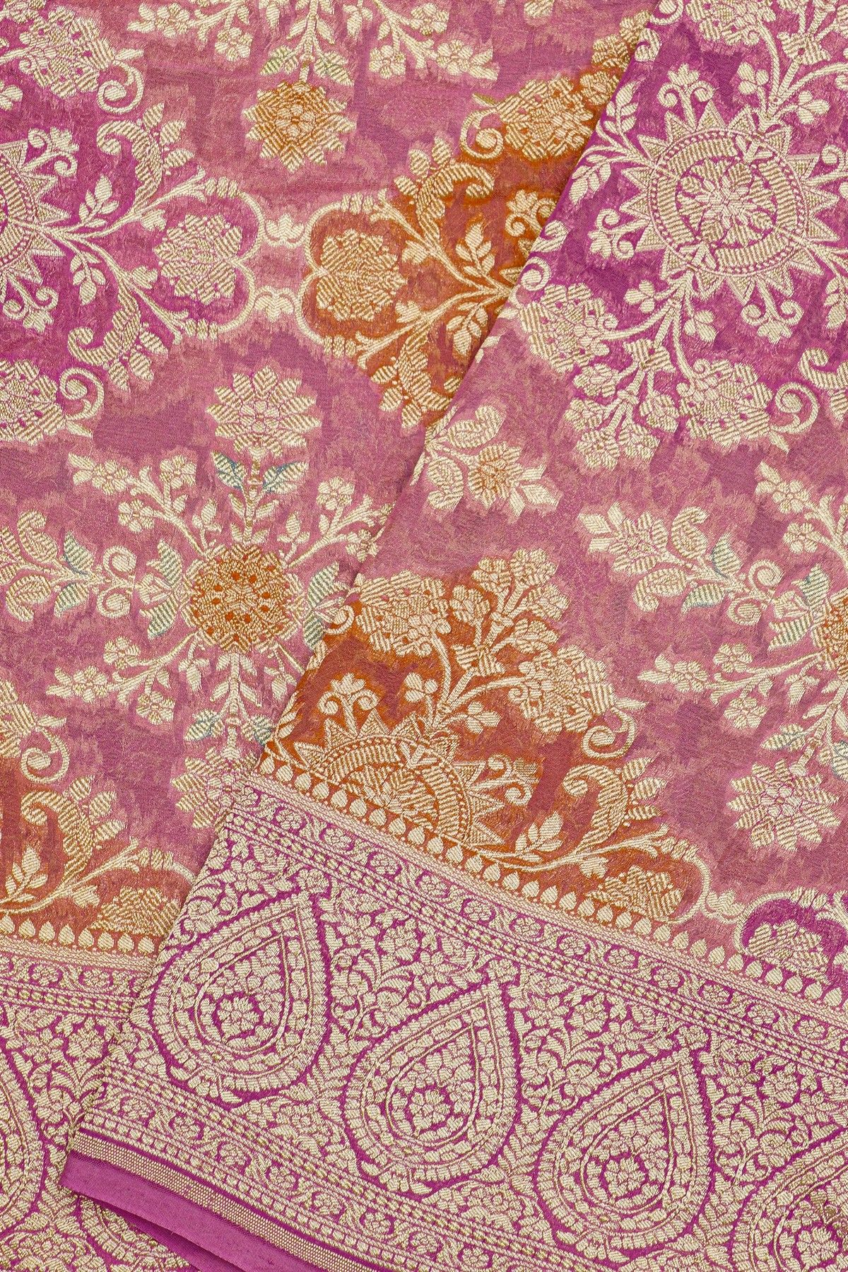 Fancy Georgette Peach Saree With Florals And Leaves Body And Self Florals And Leaves Jaal Border