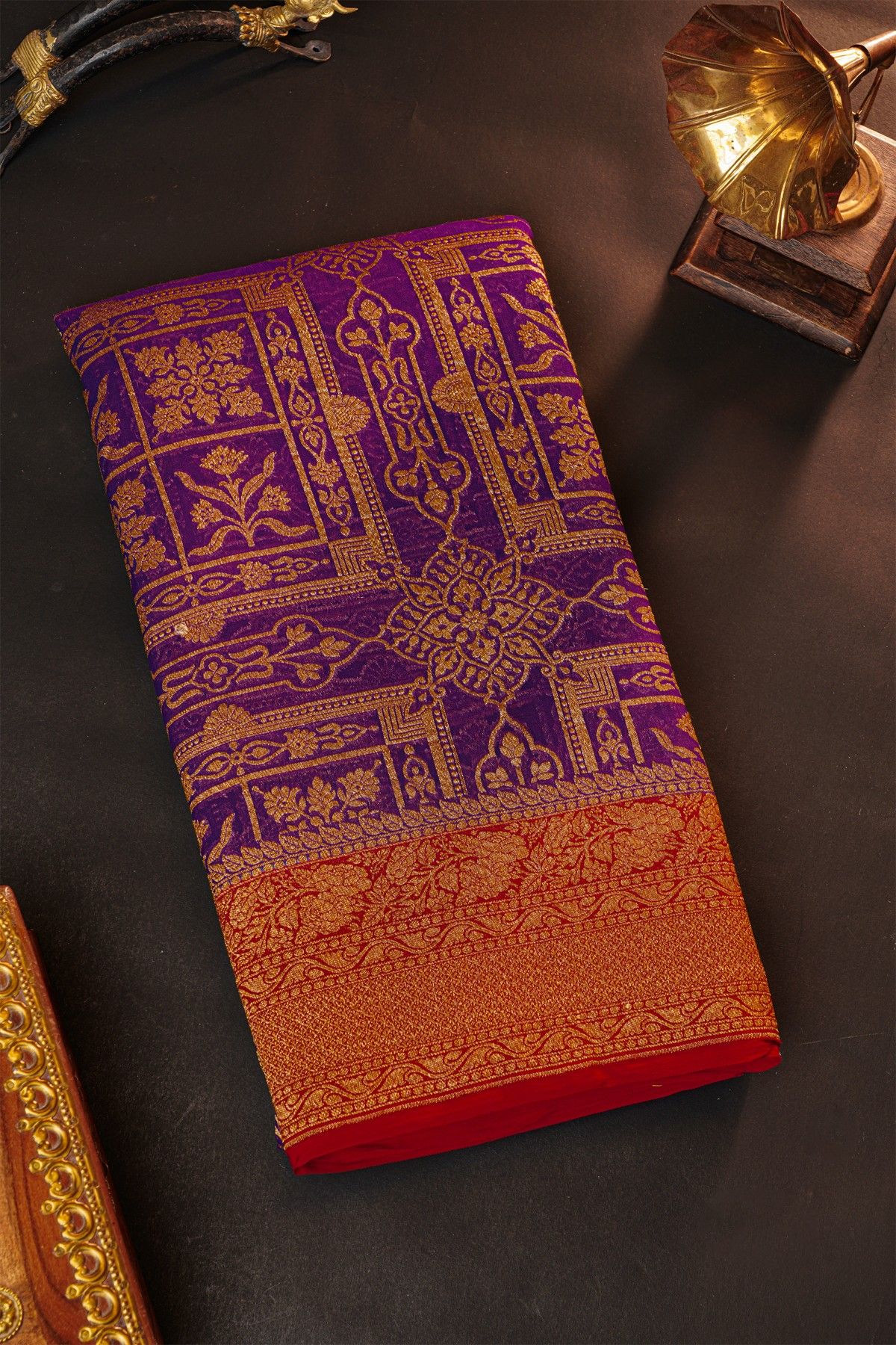 Fancy Georgette Purple Saree With Florals And Leaves Body And Contrast Florals And Leaves Border