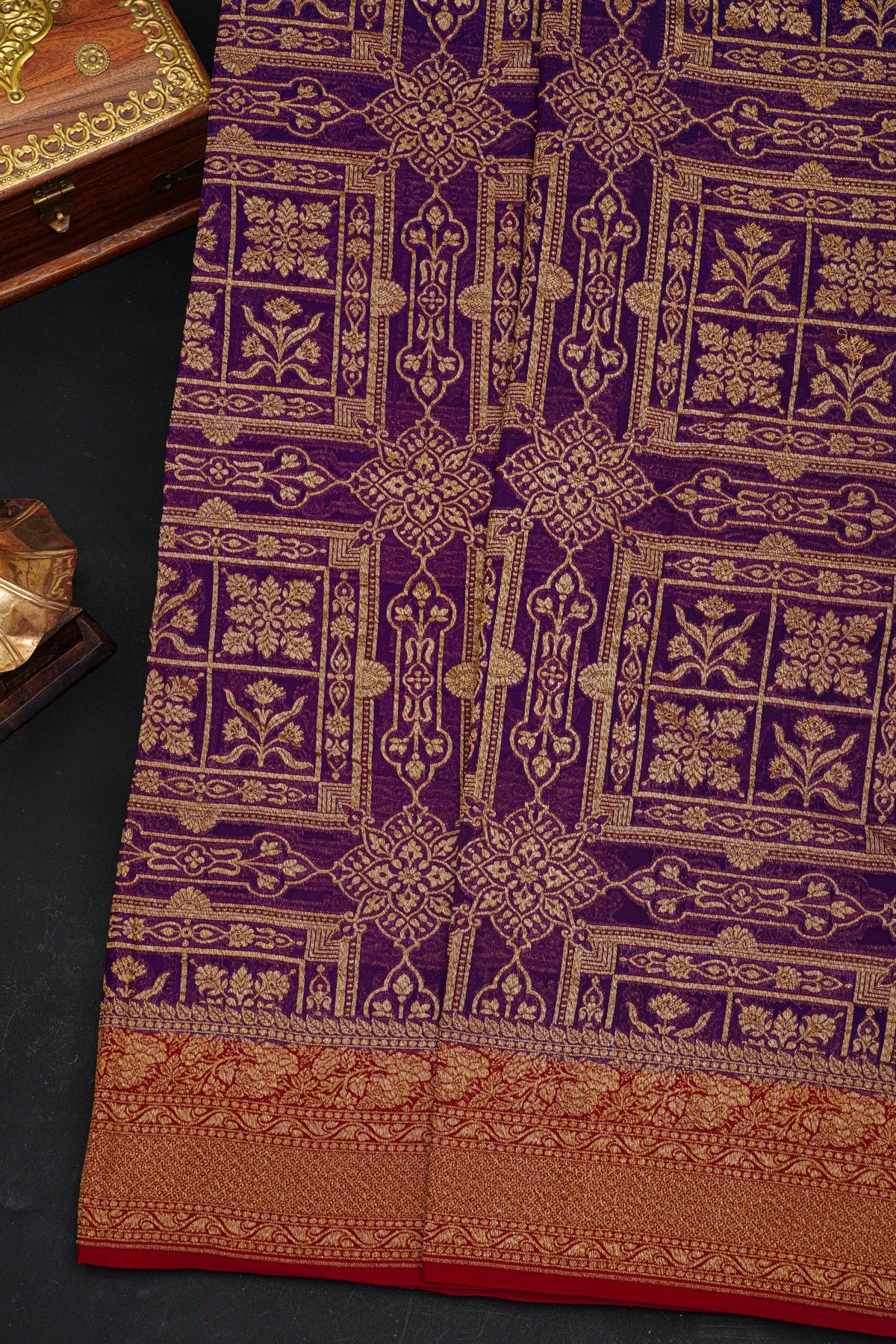 Fancy Georgette Purple Saree With Florals And Leaves Body And Contrast Florals And Leaves Border