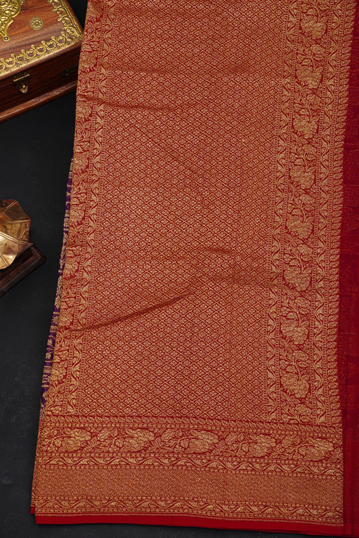 Fancy Georgette Purple Saree With Florals And Leaves Body And Contrast Florals And Leaves Border