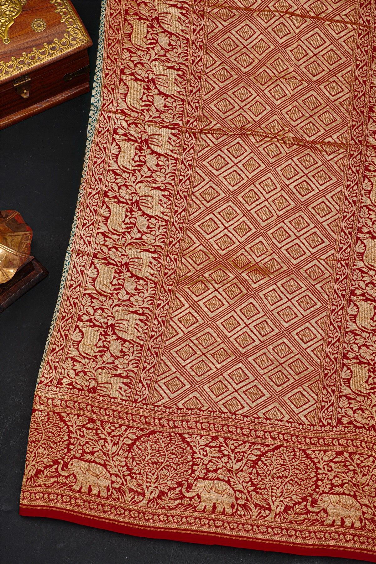 Banarasi Silk Teal Blue Saree With Zari Buttas Body And Contrast Florals And Leaves With Animals Border