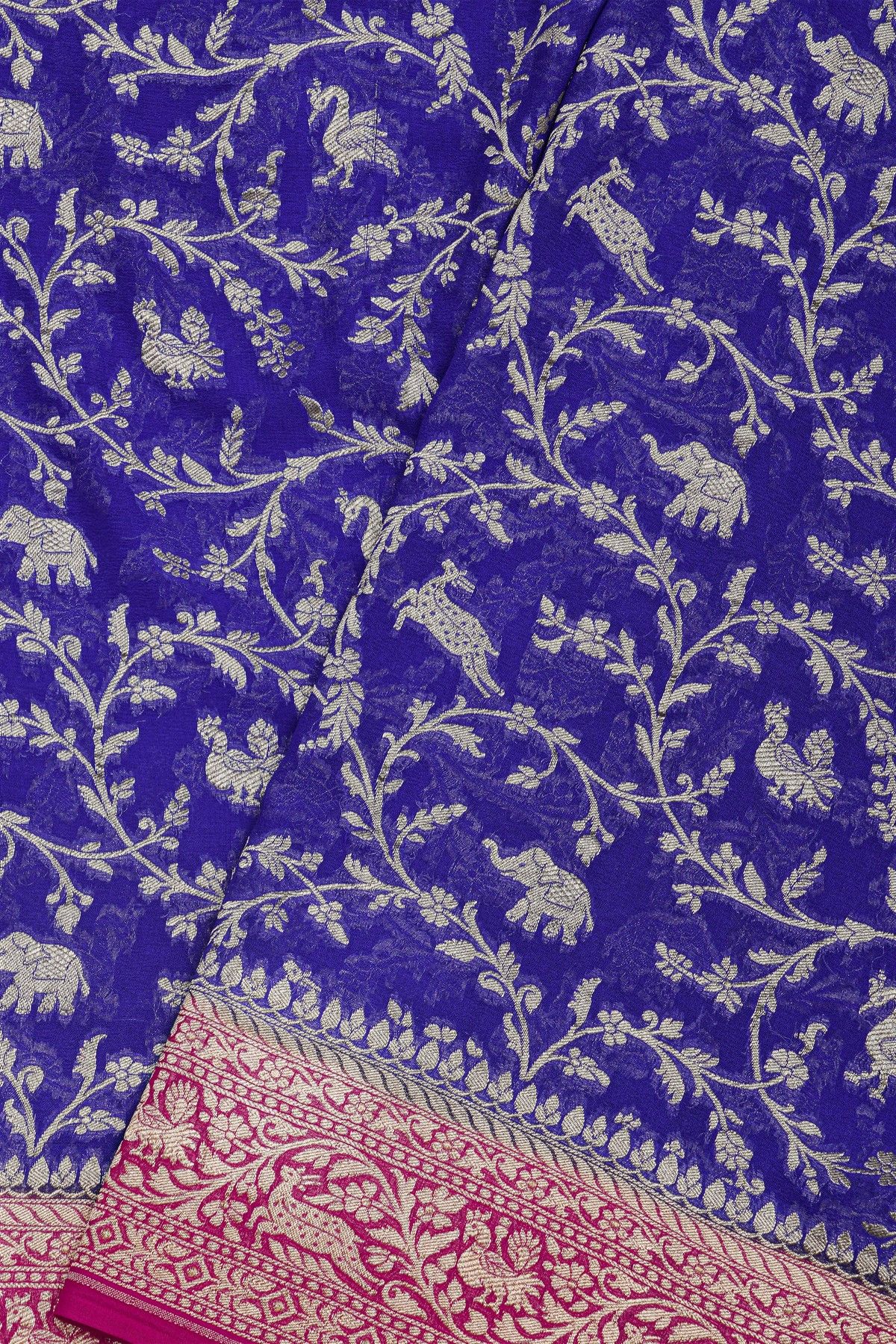 Banarasi Kaddi Georgette Royal Blue Saree With Florals And Animals Body