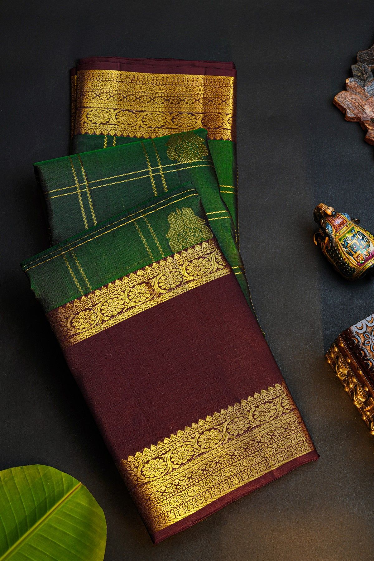 Kancheepuram Silk Bottle Green Saree With Florals And Peacocks In Zari Checks