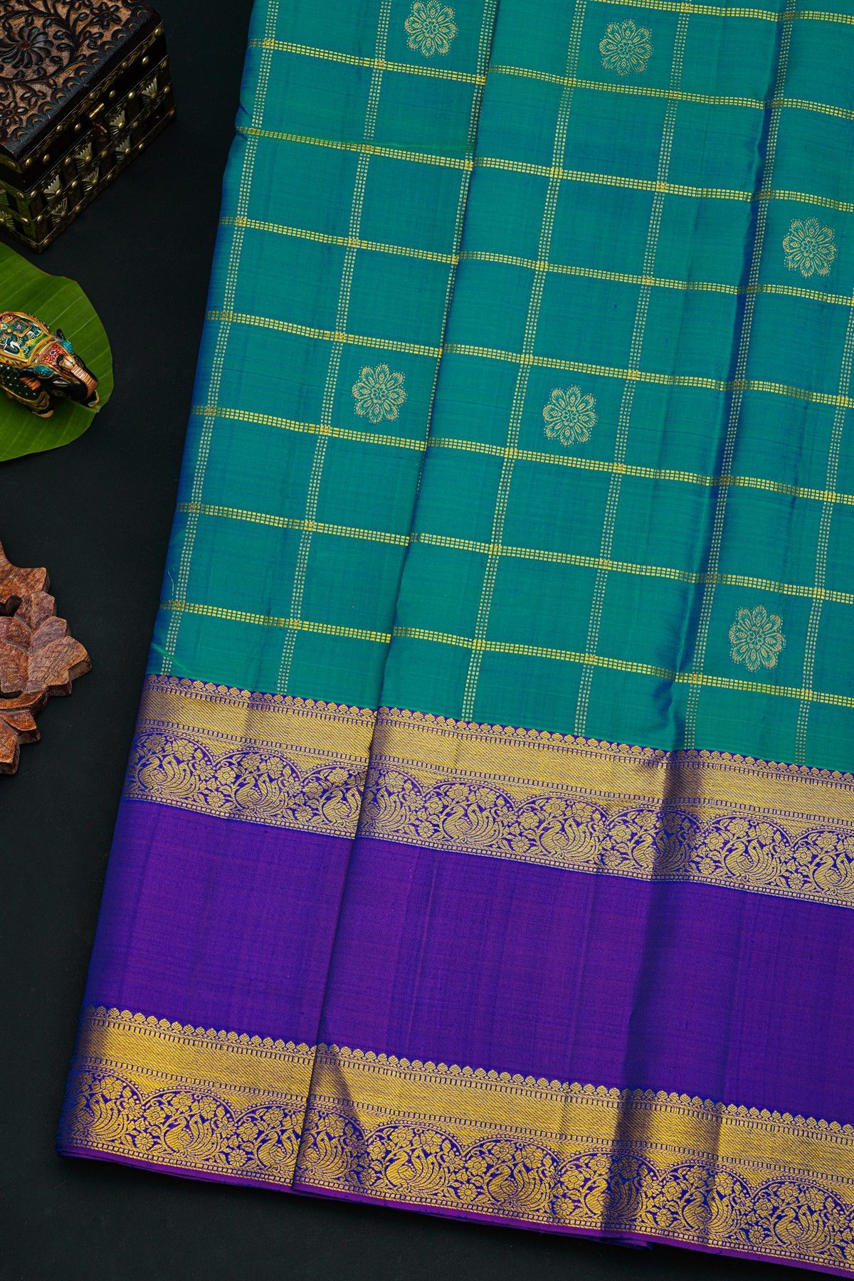 Kancheepuram Silk Peacock Blue Saree With Florals In Zari Checks Body Gap Border