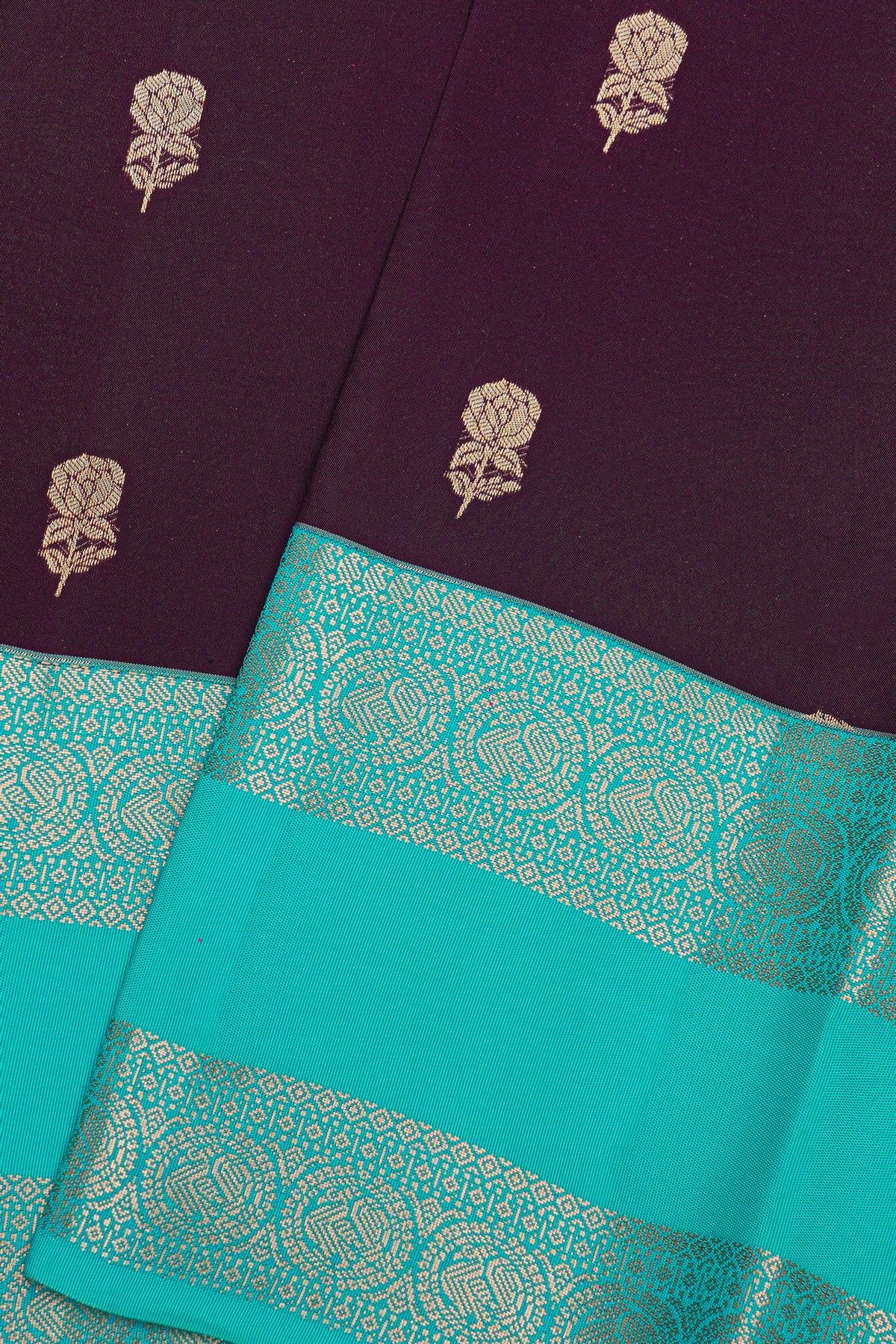 Kancheepuram Silk Wine Saree With Florals And Leaves In Zari Body Gap Border