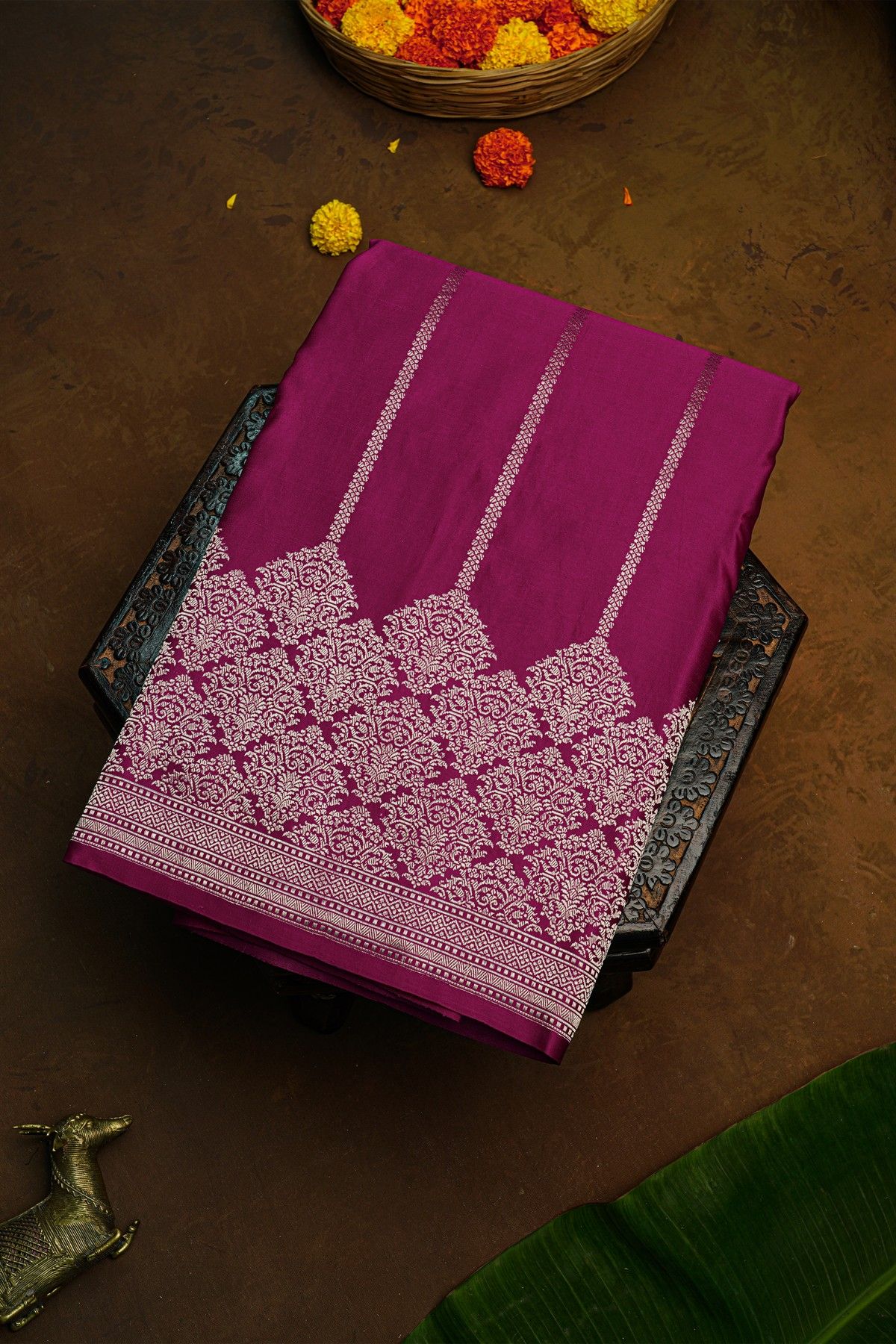 Banarasi Silk Rani Pink Saree With Florals And Leaves Body And Self Florals And Leaves Border