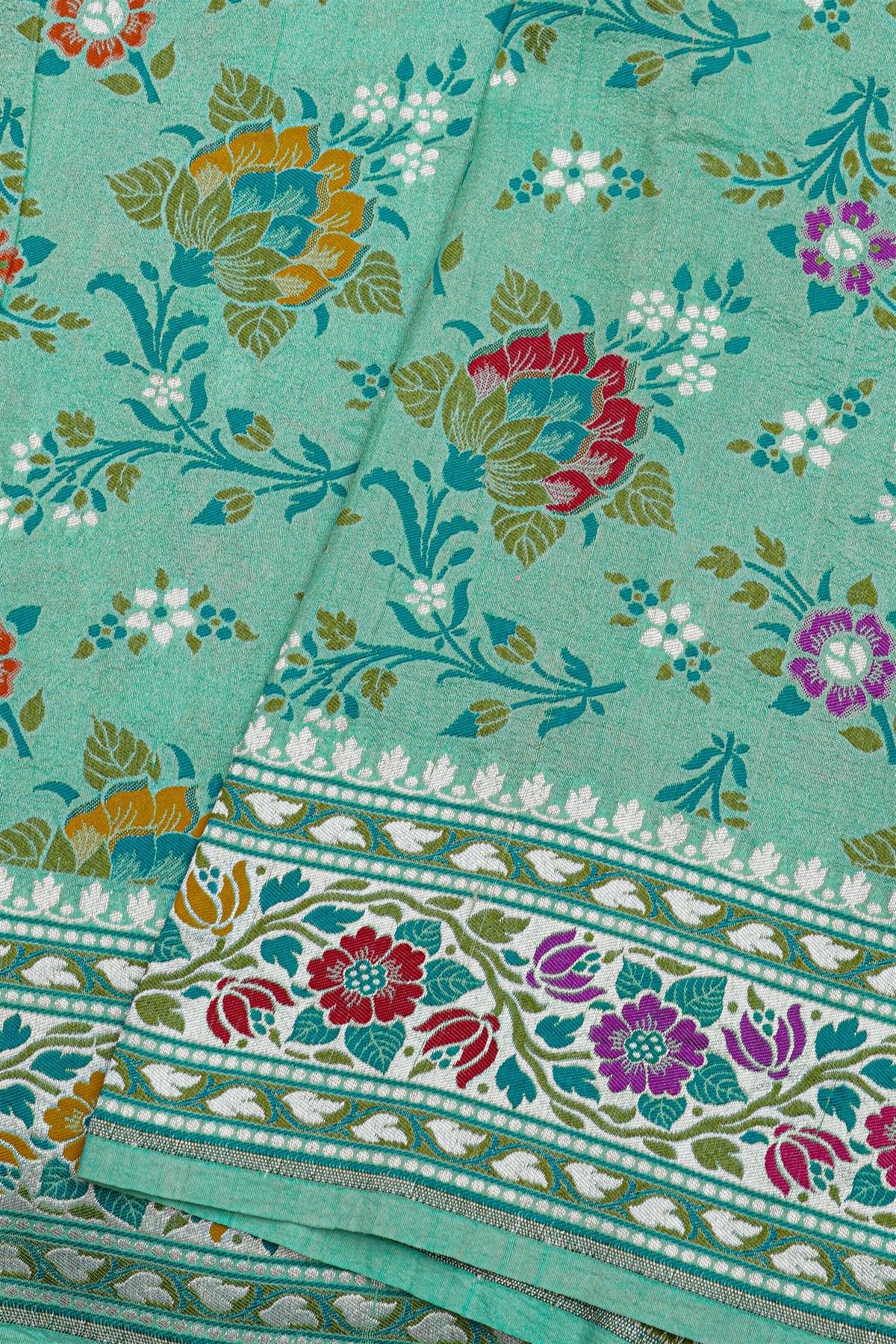 Banarasi Silk Light Green Saree With Florals And Leaves Body And Self Florals And Leaves Jaal Border