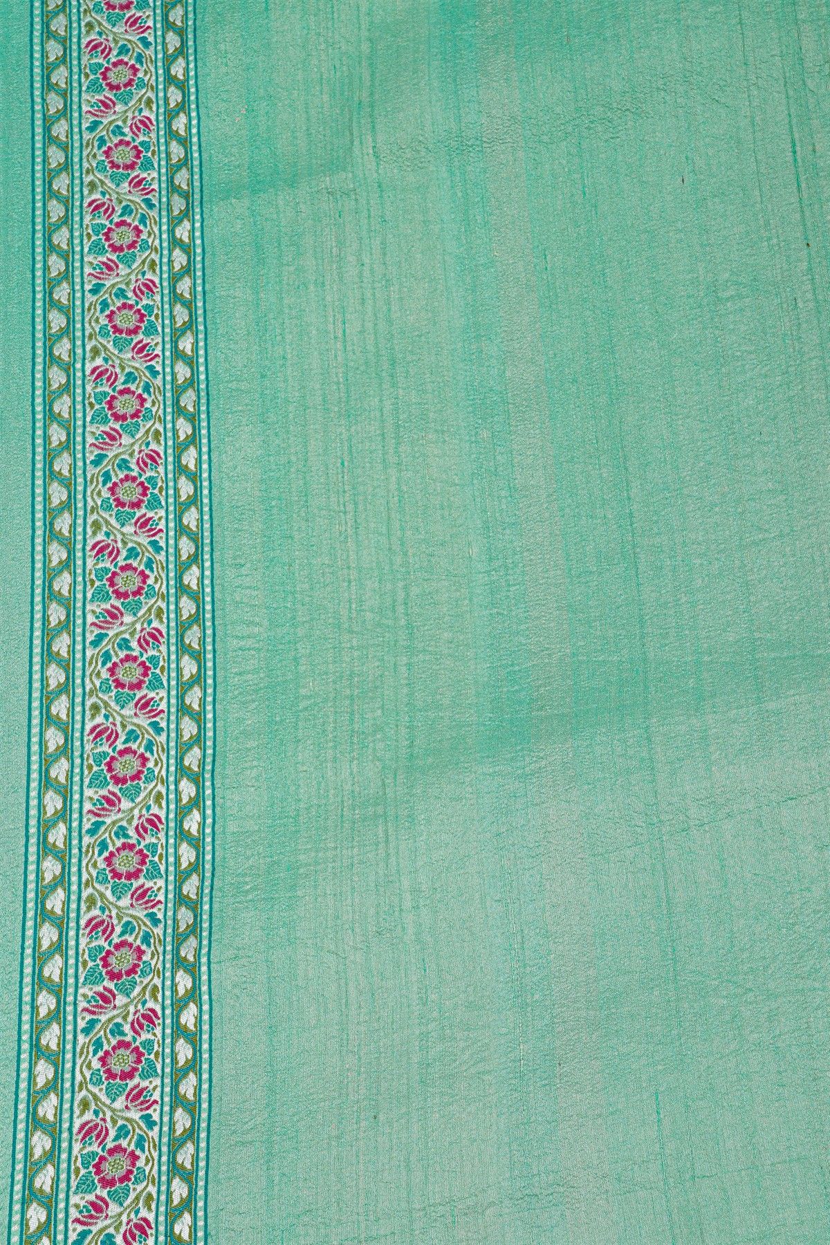 Banarasi Silk Light Green Saree With Florals And Leaves Body And Self Florals And Leaves Jaal Border