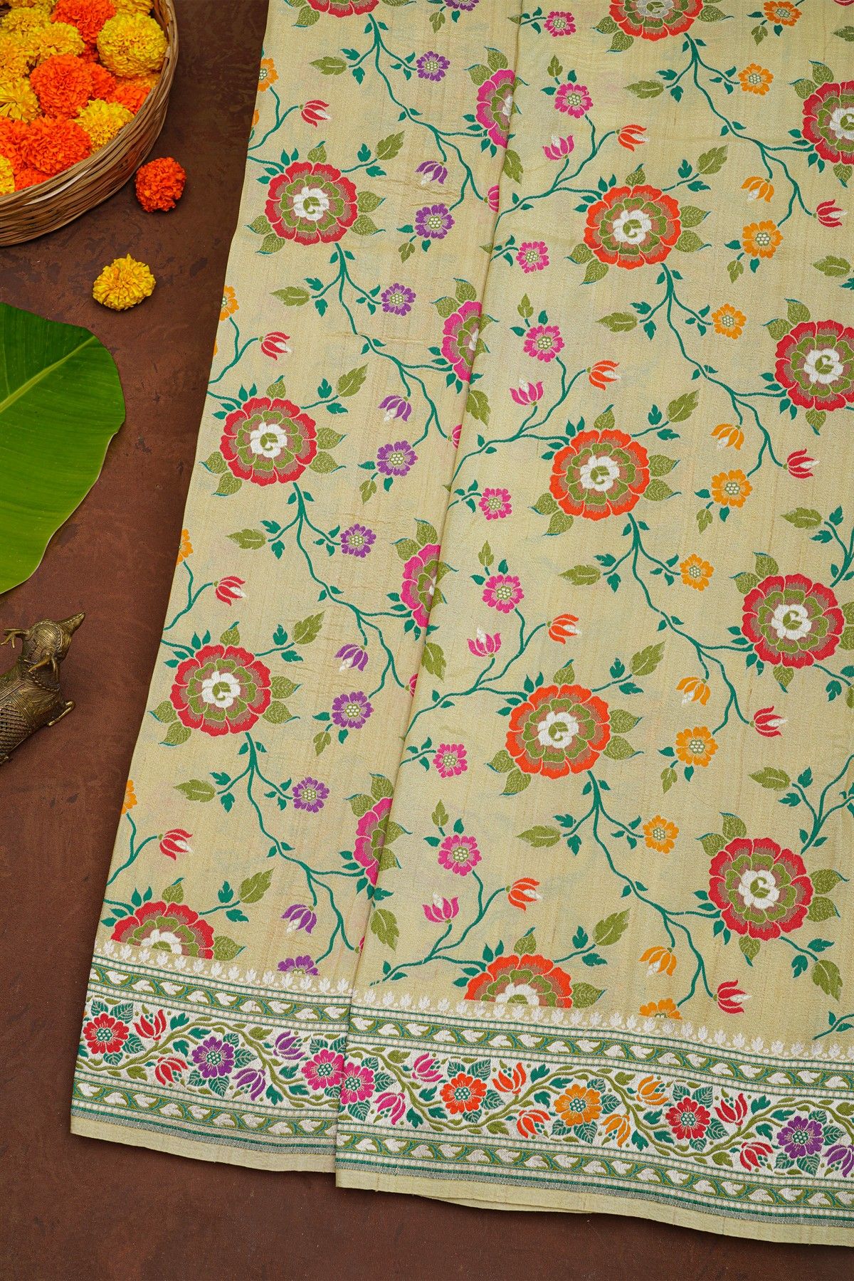Banarasi Silk Cream Saree With Florals With Leaves Jaal Body And Self Florals And Leaves Jaal Border