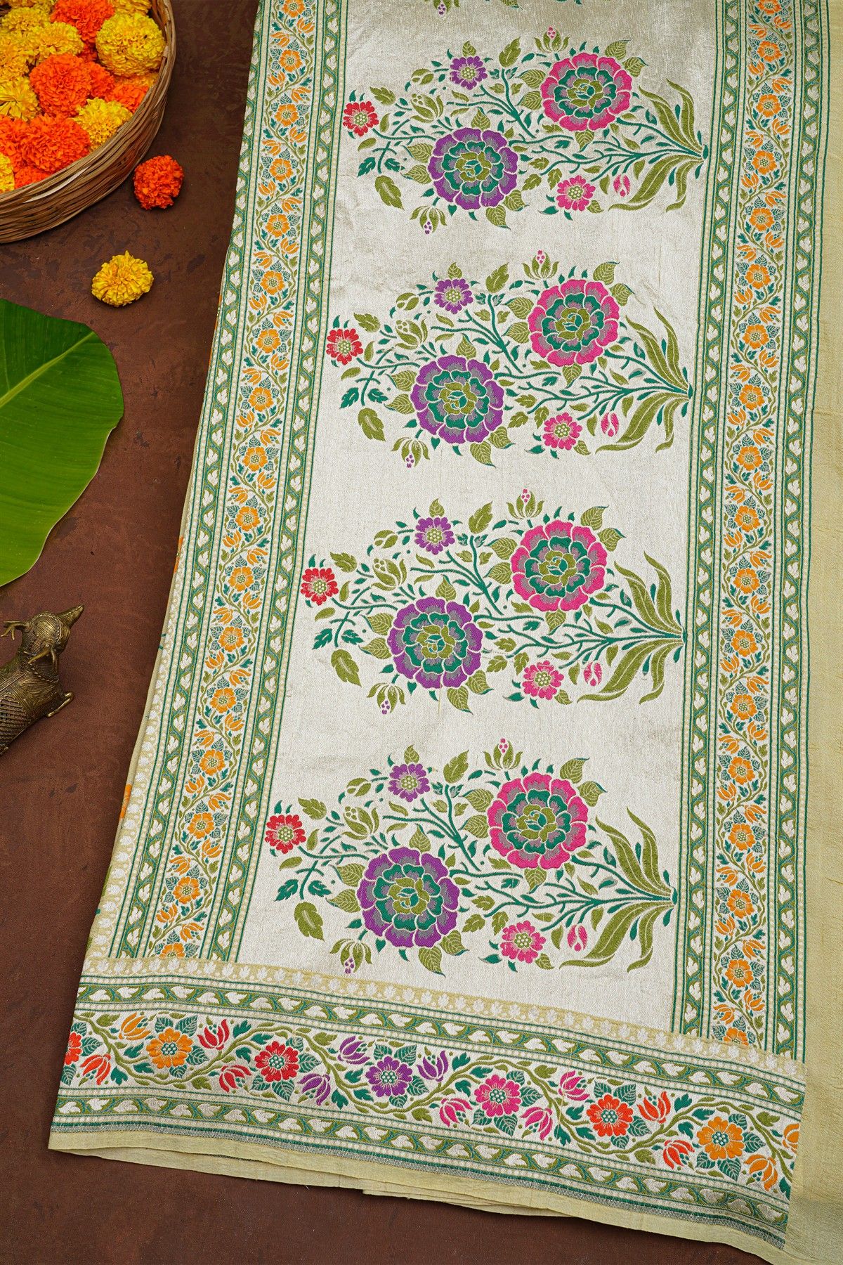 Banarasi Silk Cream Saree With Florals With Leaves Jaal Body And Self Florals And Leaves Jaal Border