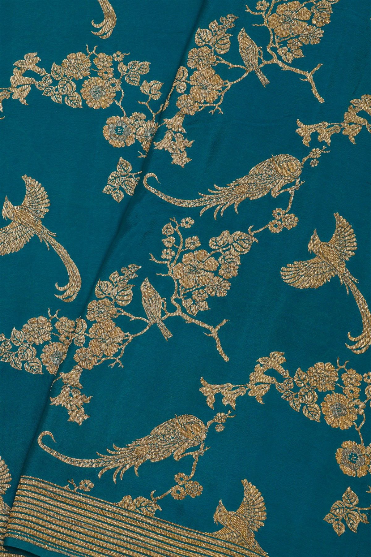 Banarasi Kaddi Georgette Peacock Green Saree With Zari Lines Border