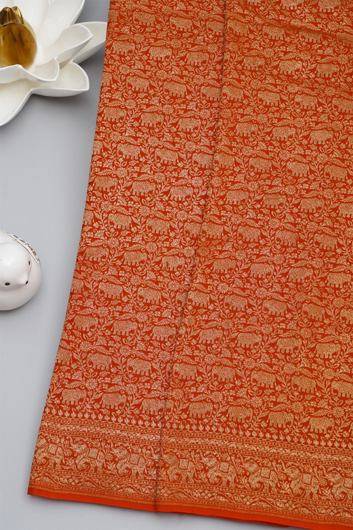 Banarasi Kaddi Georgette Orange Saree With Elephants In Zari Border