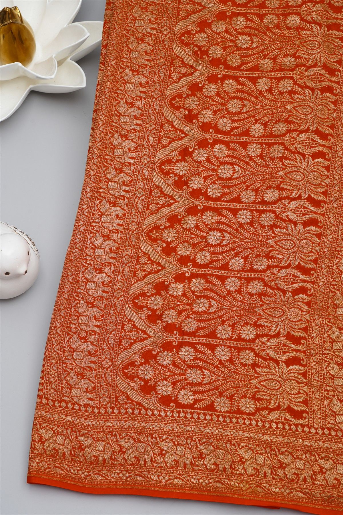 Banarasi Kaddi Georgette Orange Saree With Elephants In Zari Border