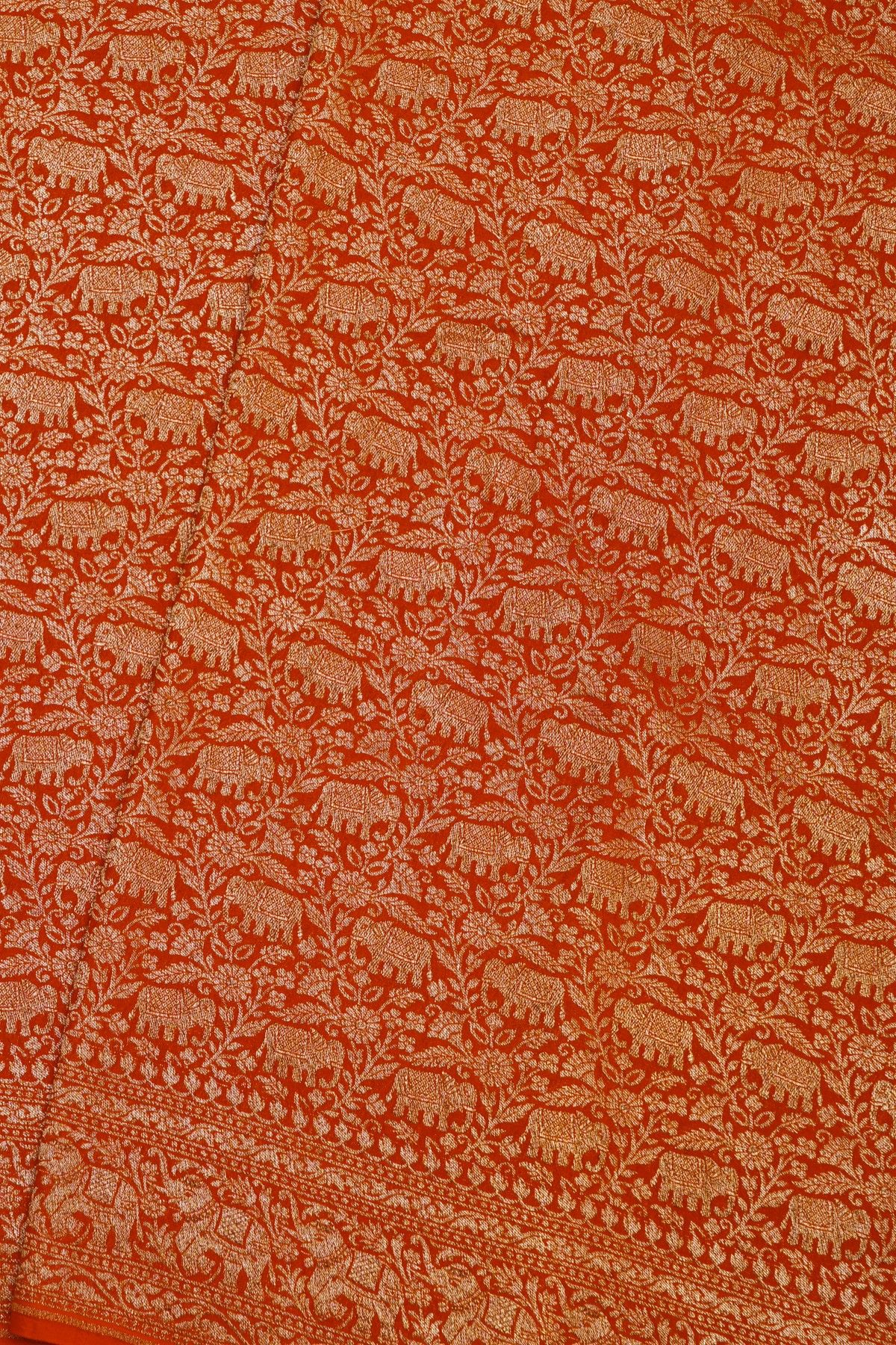Banarasi Kaddi Georgette Orange Saree With Elephants In Zari Border