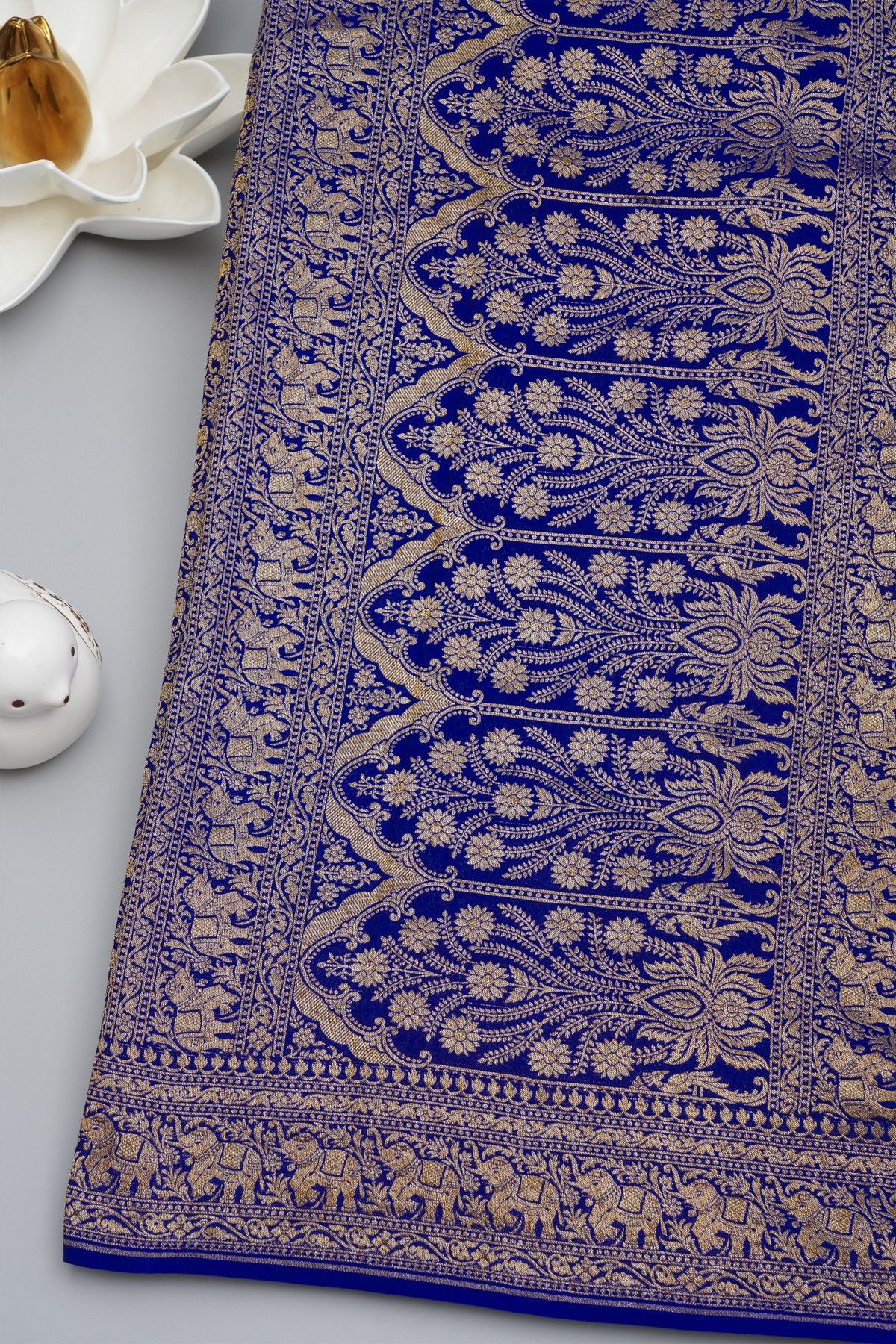Banarasi Kaddi Georgette Blue Saree With Florals And Elephants In Zari Border