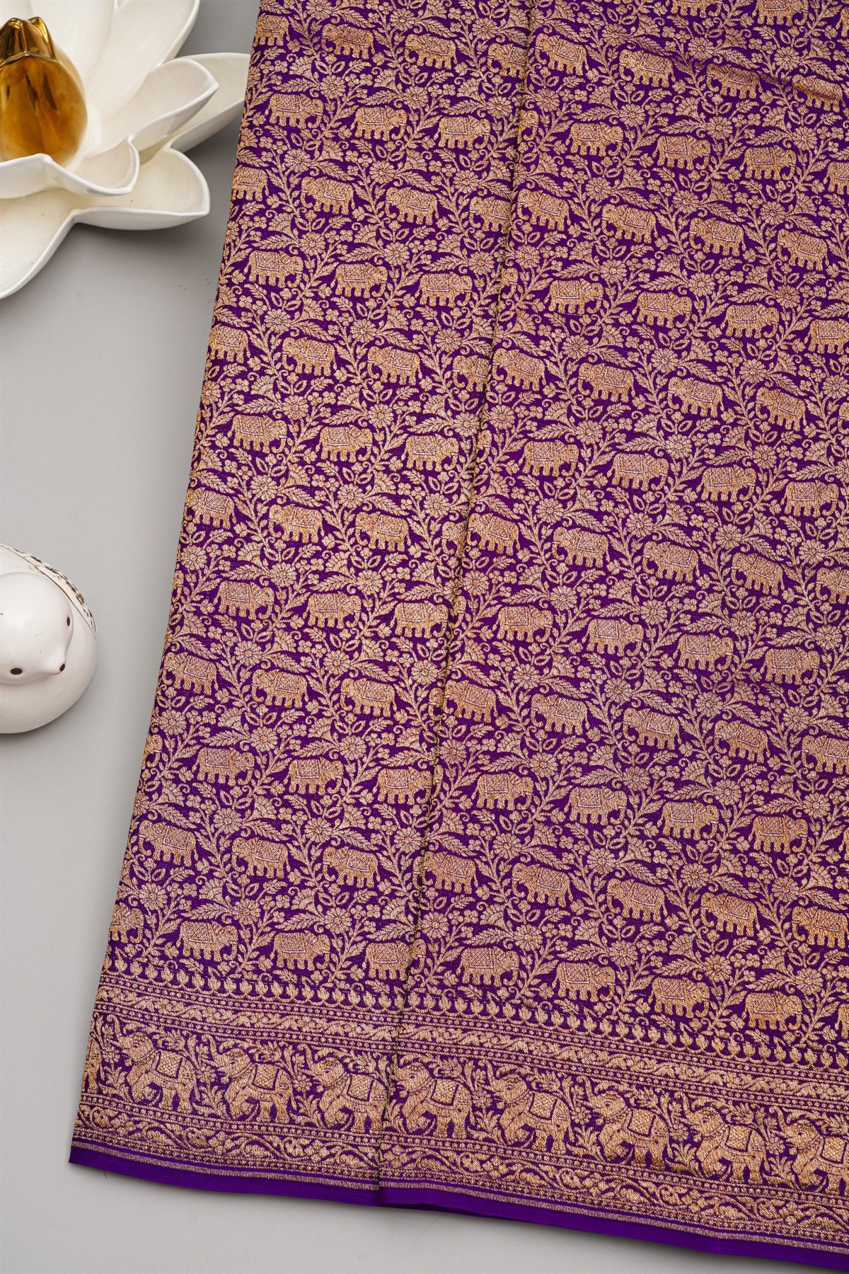 Banarasi Kaddi Georgette Purple Saree With Florals And Elephants In Zari Border