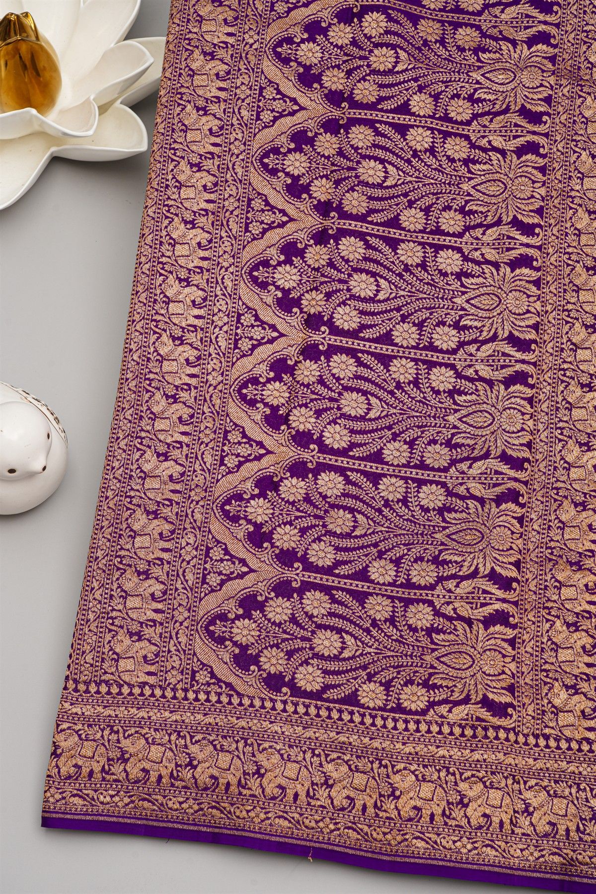 Banarasi Kaddi Georgette Purple Saree With Florals And Elephants In Zari Border