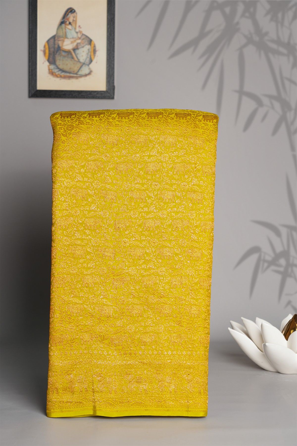 Banarasi Kaddi Georgette Yellow Saree With Florals And Elephants In Zari Border