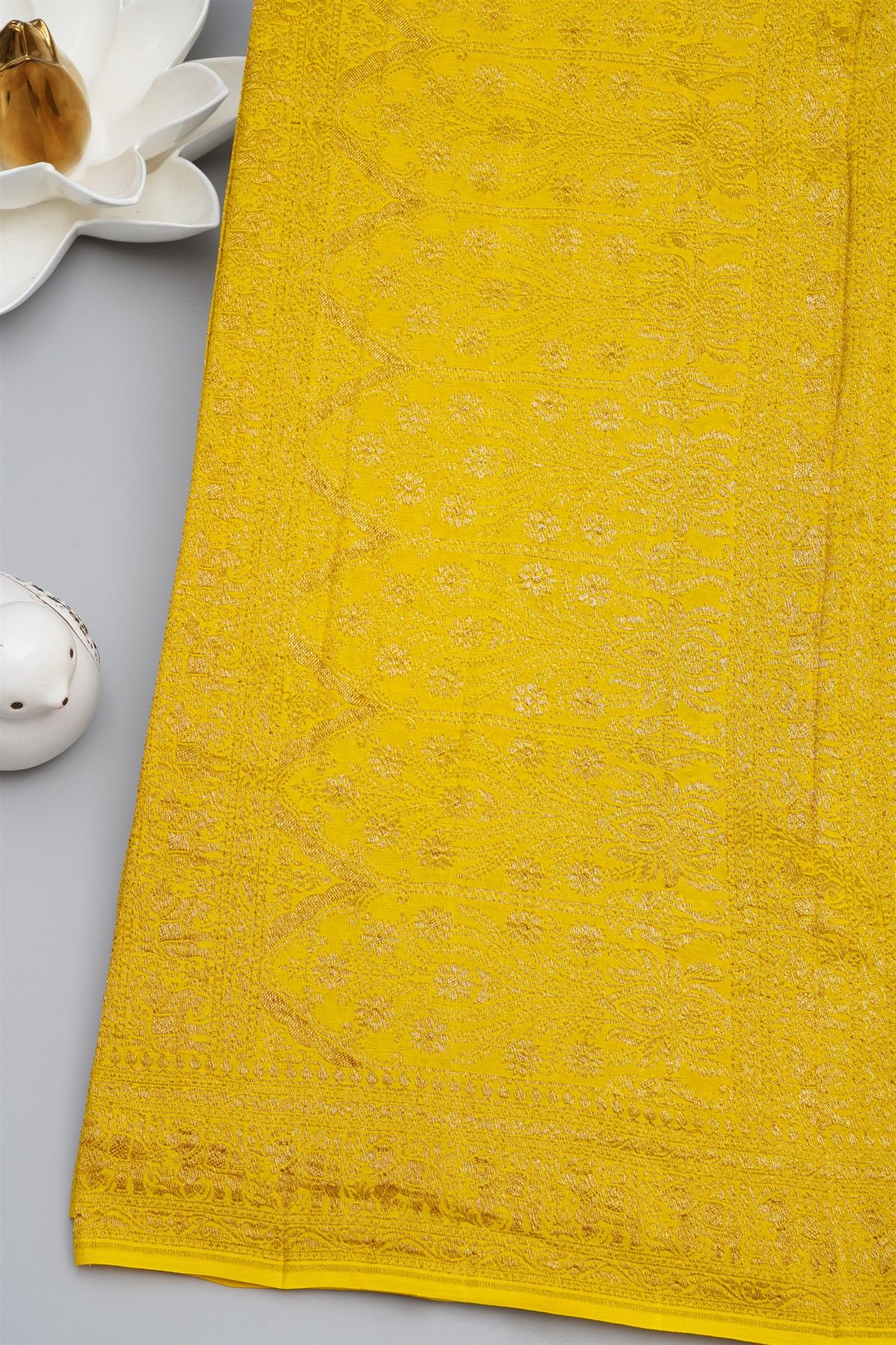 Banarasi Kaddi Georgette Yellow Saree With Florals And Elephants In Zari Border