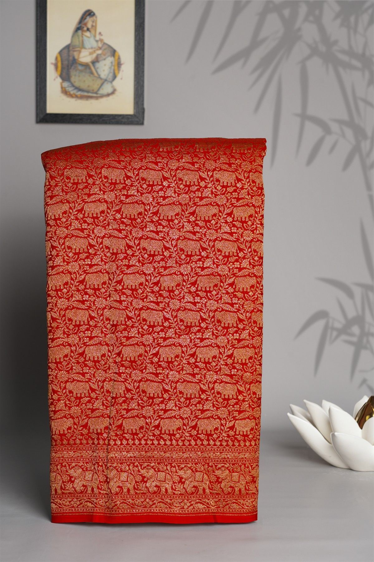 Banarasi Kaddi Georgette Red Saree With Elephants In Zari Border