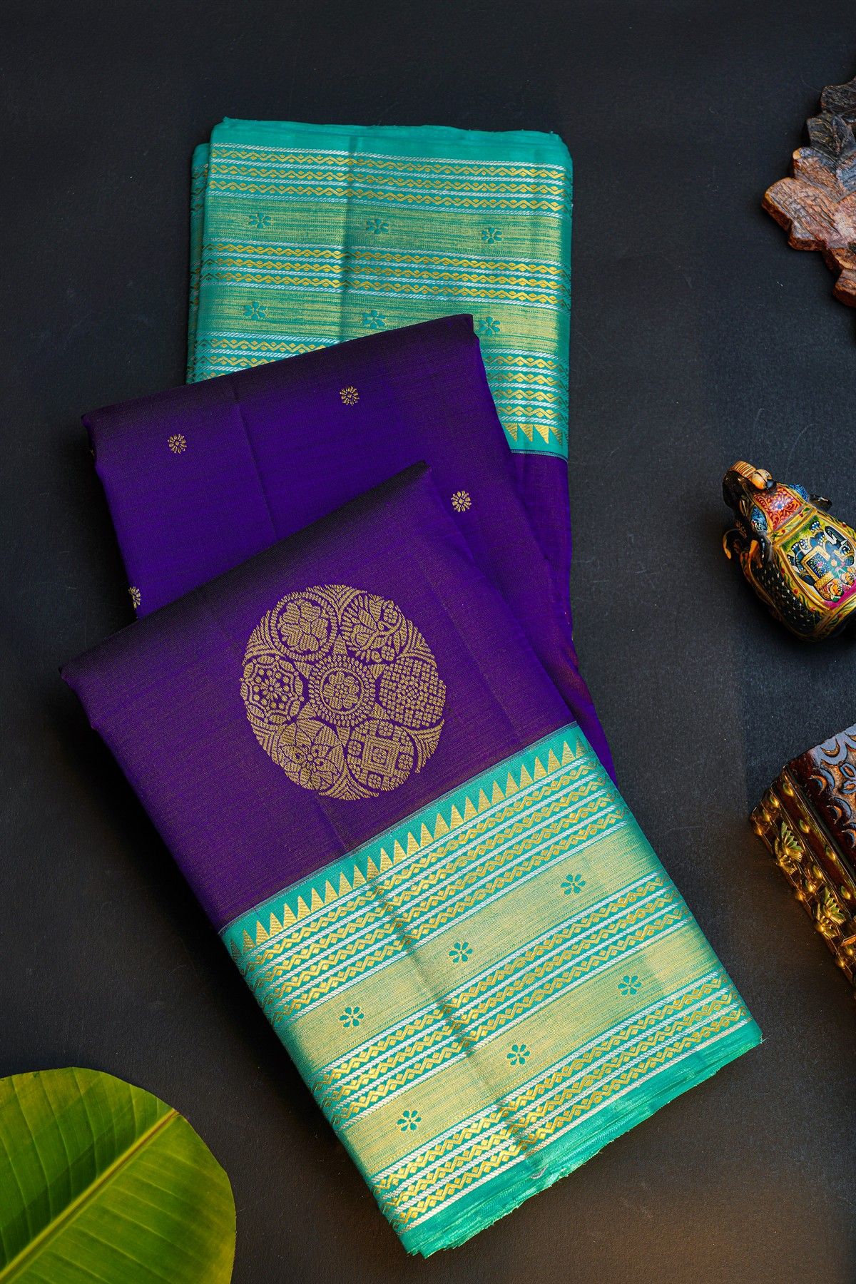 Kancheepuram Silk Royal Blue Saree With Florals And Buttis Body And Contrast Zig-Zag Lines And Florals Border